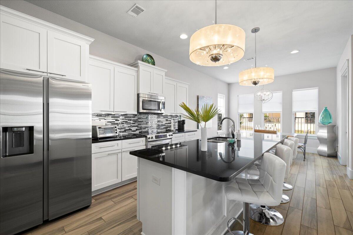 Experience the ultimate waterfront lifestyle in this Mediterranean-inspired retreat, perfectly positioned on a premium canal-front lot with serene fountain views. This isn't just a residence; it's a sophisticated escape where high-end luxury meets a relaxed, coastal energy.

Freshly updated in the summer of 2026, the home shines with meticulous attention to detail, including new flooring in the upper-level bedrooms, seventeen newly installed windows, and crisp interior trim paint throughout. Every corner of this fully furnished sanctuary radiates modern elegance, featuring sleek decor and premium finishes that beautifully capture the natural light.

The open-concept layout is designed for effortless living. Sun-drenched spaces flow seamlessly together, offering an inviting backdrop for quiet afternoons or vibrant social gatherings. At the heart of the home, the chef-caliber kitchen stands ready for any culinary endeavor, equipped with top-tier appliances and an abundance of custom cabinetry.

Privacy is paramount with four generous bedrooms, each serving as a personal sanctuary with its own dedicated en-suite bathroom. The primary suite is a true highlight--a tranquil haven featuring a spa-inspired bath that makes every day feel like a getaway.

Located in a sought-after community, you are moments away from the area's best dining, social hotspots, and recreation. To complete the experience, this home comes with a six-seater golf cart, to explore everything Sandestin offers.