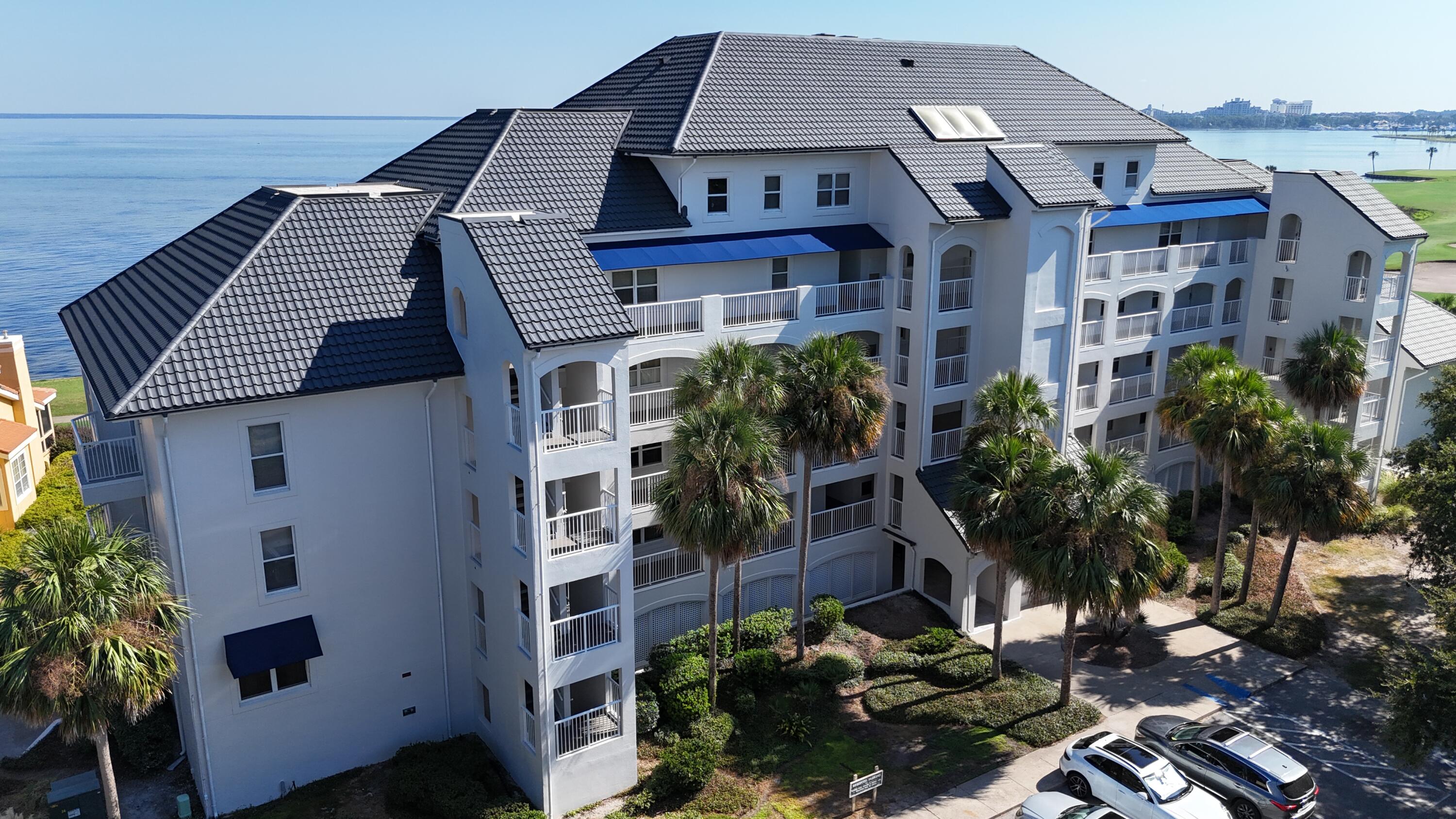 MOTIVATED SELLER - Rare opportunity - ONLY 3 Bedroom Unit in the building currently for sale.  Experience sophisticated living in this 3 bedroom, 4 bathroom, 2,213 square foot, bayfront penthouse. A real hidden treasure within Sandestin Golf & Beach Resort®. From your private balcony, take in serene sunrises, stunning sunsets, and the gentle activity of boats, birds, and even playful dolphins. Designed to maximize natural light, the open living area features luxury vinyl plank flooring, custom window treatments, high ceilings and is one of only three 3 bedroom units in Players Club on the Bay, a boutique building with just 28 units. It provides a covered parking space, golf cart parking, additional ground-level storage, and access to a private pool and a communal patio for gatherings. Enjoy breathtaking views of the Choctawhatchee Bay and the 9th Fairway of the Linkside golf course from nearly every room in this fifth-floor condo. 

The main-level primary suite offers a true retreat with a spa-like bathroom featuring marble countertops, double sinks, walk-in shower and generous storage. Two upstairs bedrooms include views to the Bay and golf course and ensuite bathrooms. Recent upgrades and renovations include new flooring (2024), new HVAC (2023), fresh paint, new stainless steel appliances, and updated furnishings.

Players Club is meticulously maintained, with a new elevator (2022), a steel metal tile roof (2023) rated for category 5 winds and extensive waterproofing improvements (2024). Both the Florida Structural Integrity Reserve Study and the Milestone Inspection have been completed.

This exceptional property offers easy access to world-class golf, dining, shopping, and the sugar-white beaches that make this area so sought after.

Sandestin Golf and Beach Resort features more than seven miles of beaches and pristine bay front, four championship golf courses, 15 world-class tennis courts, a 226-slip marina, a fitness center, spa and celebrity chef dining. Shop, dine and play at the charming pedestrian village, The Village of Baytowne Wharf and more. Inside the gates of the resort, residents enjoy a balanced lifestyle, spanning the 2,400 acres from the beach to the bay. The entire resort is interconnected by miles of pedestrian, bike and golf cart paths that weave through groves of live oaks, meandering past natural lagoons, fountains, man-made lakes, and meticulously landscaped fairways. Excluding furniture but can be separately negotiated. Listing agent is related to the seller.