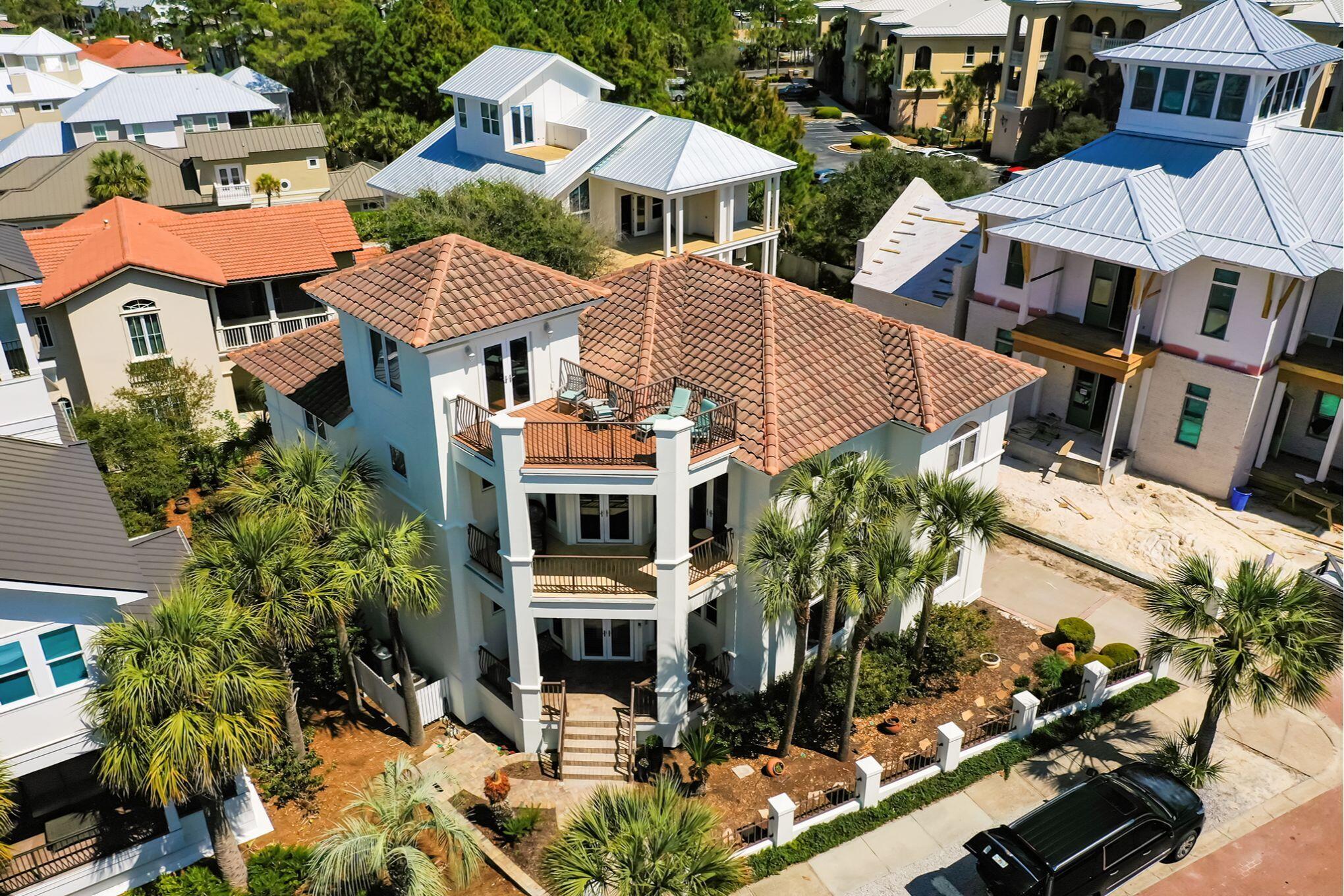 Pristine Beach home is move in ready for Spring Break and Summer fun. It is sold furnished with fresh exterior and some interior paint. Home has never been rented. Gourmet kitchen with new Scotsman ice maker, wine fridge and 2nd extra sized stainless refrigerator located in the garage. New 1st floor HVAC unit add in 2022, new 2nd floor HVAC in 2023 Home is located on the highly coveted beachfront Street of White Cliffs Crest & is prominently situated on an elevated site, just one lot back from the Gulf.  Only steps from a beach access equipped w/ a Gazebo to an exclusive ''private'' beach with daily security. Has community pool, playground, tennis & pickle ball court & Clubhouse w/fitness center in White Cliffs gated subdivision. Home has homey feeling, not often seen in a Beach House. Enter door from the covered drive portico then 2 steps into large kitchen to carry rainy-day groceries. A convenient access to the laundry off kitchen. Has (2) HVAC units and Nest thermostat(s) & Ring Cameras. A NEW 2nd FLOOR HVAC was installed in 2023. Property is equipped with a Life Source Whole House water filtration system. One Bedroom is on the 1st floor level. Home is exclusively provided with its own Home Elevator, in order to enjoy an easier access to the 4 Bedrooms on the 2nd floor level. Home has 5 Baths w/2 downstairs & 3 on the 2nd floor level. Master Bath has stunning walk-in shower, private toilet w/Bidet, a large whirlpool tub & big walk-in Closet. 2 of the bedrooms are equipped with high quality, space saving Murpy Beds, that allows 1 room to have a couch, workspace area & Bunk beds all in the same room. The other Murphy Bed is in the multi-use Office Bedroom w/built-in cabinets. Home has multiple porches. One is a great sun deck located just outside the 3rd floor "Crows Nest" or "Small Tower Den" also furnished with its own mini kitchen. Another porch of the Master Bedroom also faces the Gulf. 2 other porches wrap around the rear of the home, one on Level 1 off the den and the other off 2nd Level Bedroom that overlooks a Private Courtyard, equipped with a Water Fountain & a Well-water outside irrigation system. Property has a very long driveway w/1 car detached Garage for extra parking. More street parking space in the Front. More storage in Basement room on west side off Courtyard. A well maintained home in great condition. A Rare opportunity for a Lucky Buyer, on this Coveted Street located so close to the Beach, in this rent-restricted gated community @ half the price of the beachfront across the street.