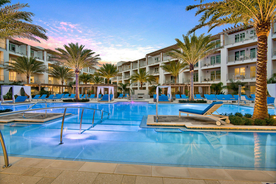 Where Coastal Luxury Meets Effortless Living! This exceptional condominium is positioned just a two-minute walk from Rosemary Beach and 30Avenue which offer premier shopping, dining & entertainment. This 30A getaway can be the ideal family retreat as well as a top-producing investment property with rental income projections at nearly $72K and cash on cash return projections at 5.3% per year. Situated with a gorgeous view of the pool & lawn, Unit 335 offers two separate balconies and custom built-in bunk beds in the hallway. Spend quality time at the high-end amenities which include a resort-style pool, spa, fitness center, rooftop deck and on-site restaurant. The unit has been designed with a coastal feel and conveys fully-furnished. The primary bedroom is a dreamy escape with its private balcony and large primary bathroom. The living room is welcoming with its large sliding glass doors and light pouring in. The chef's kitchen showcases high-end appliances and crisp cabinetry. The guest bedroom has been beautifully designed with extra storage and a large ensuite bathroom. With affordable HOA dues, the return on investment for this property will be maximized. Explore this lovely sanctuary designed for relaxation along 30A!