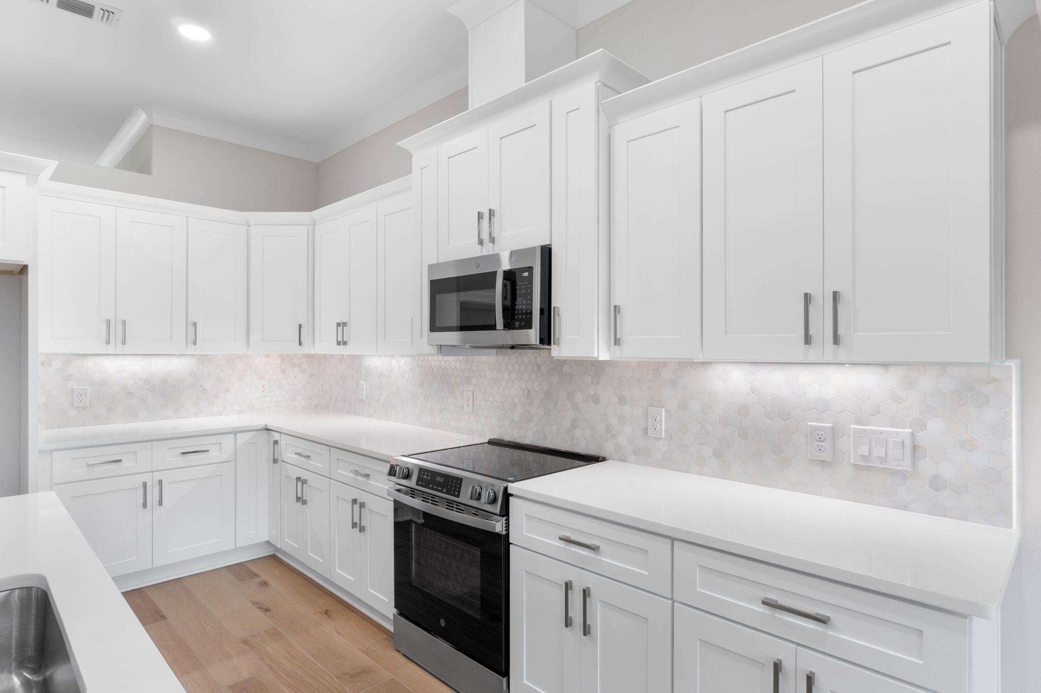 Luxury NEW Construction Custom-Built Home in Holley by the Sea!
Enjoy exclusive access to the renowned Holley by the Sea amenities—multiple pools, a fully equipped gym, tennis courts, waterfront park, and deeded access to Santa Rosa Sound. Ideally located within the community, this stunning 4 bed / 3 bath tri-split floor plan by Robbins Builders offers exceptional design,quality craftsmanship, and convenient access to Navarre Beach, shopping, and Hwy 98 to Hurlburt Field AFB.From the inviting foyer, the home opens to the formal dining room and dedicated office before flowing into the spacious open-concept living area. The gourmet kitchen is a showpiece with shaker cabinetry topped with crown molding, beautiful quartz countertops, tiled backsplash, stainless steel appliances ...... undermount sink, and an oversized wraparound pantry. A large center island connects seamlessly to the breakfast nook and family roomperfect for everyday living and entertaining.
Wood-look staggered tile extends throughout the foyer, dining room, main living spaces, laundry room, and all bathrooms for a cohesive, high-end finish.
The owner's suite features a trey ceiling, ceiling fan, and an expansive bathroom with a large tiled shower, separate soaking tub, quartz double vanity with framed mirrors, and an impressive walk-in closet. Two generous secondary bedroomseach with solid door closets and ceiling fansshare a full bath with tub/shower combo and linen storage. A separate guest/teen suite offers its own full bath and direct access to the large covered back porch.
Additional features include a spacious laundry room and an oversized 3-car garage, ideal for trucks, equipment, or outdoor toys.
Situated on a 100 x 200 lot, the exterior includes a grassed yard with irrigation, sprinkler system, lawn pump and well, and a digital programmable timer for easy care. Build quality is enhanced by a TAEXX in-wall pest control system, Fabric Shield hurricane protection, and a dimensional shingle roof for potential insurance savings.
Upgrades throughout include crown molding, recessed lighting, framed mirrors, a deluxe lighting package, 50-gallon water heater, garage door remotes, and attic pull-down stairs.
Contact us today for details, color selections, and current construction status.
Photos are of previously completed homescolors, fixtures, and finishes may vary.** This home is planned for white cabinets in the kitchen and bathrooms.