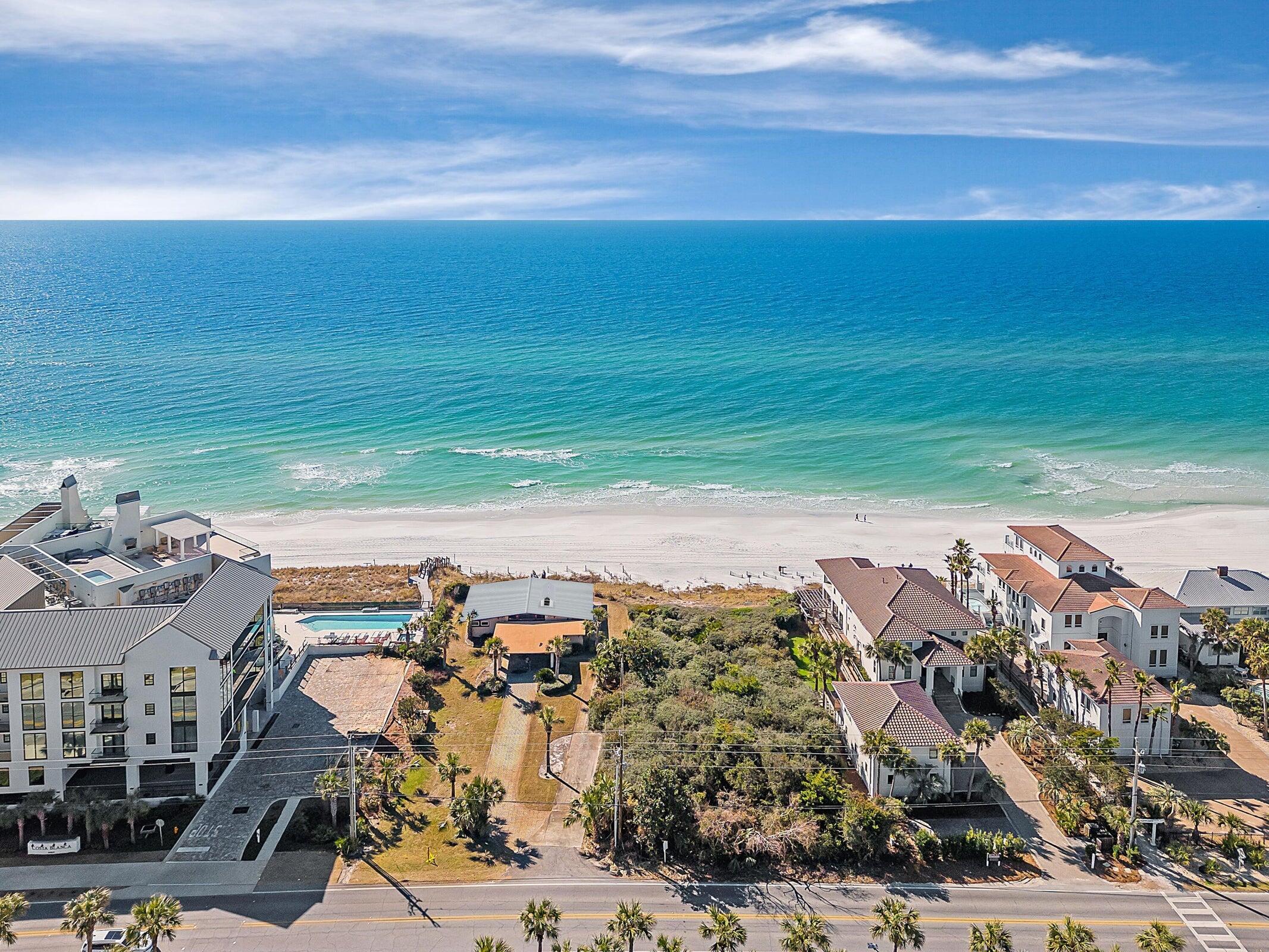 PRIME VACANT LOT WITH 75 FT OF BEACH/GULF FRONTAGE TO THE MHWL! Prime 30A Vacant Beachfront Lot located across from Gulf Place at 393 & 30A!This premium Vacant Gulf Front Lot has 75 Feet of beachfront, with sweeping views of the pristine white sands and emerald waters! This is the perfect opportunity to build your custom beachfront home on this premium 75-foot Gulf front lot in the heart of Santa Rosa Beach. Located along Scenic Highway 30A and just steps to Gulf Place, enjoy easy access to dining, shopping, and the area's relaxed coastal vibe. This .56-acre property offers endless  possibilities and forever views of sugar-white sand and emerald Gulf waters. Experience one of 30A's most coveted locations! ALSO AVAILABLE AS PART OF A 225 FT BEACH/GULF FRONT ASSEMBLAGE!