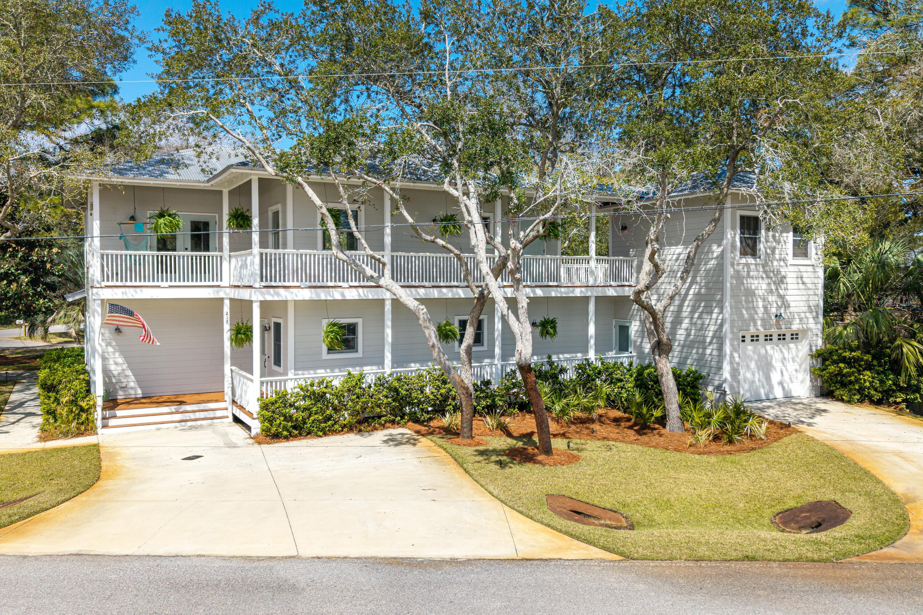 Incredible opportunity to own a fantastic 4-bedroom, 3-bath home surrounded by nature close to the Bay! This property is positioned on a beautiful corner lot that is over a quarter acre and a serene setting with mature live oak trees and natural surroundings. The home encompasses plentiful outdoor spaces including a wraparound porch, balcony & amazing new open air, upper level deck perfect for entertaining, outdoor dining or simply relaxing with others. Just past the deck is an additional bonus area great for an office, art studio, bedroom or lounge. Ideally there is plenty of storage throughout the home along with a climate controlled 3-car garage. From the upper deck, you have direct access into the kitchen, wet bar and living & dining area - making entertaining easy. Start enjoying that coastal lifestyle tennis courts, racquetball, soccer fields, walking trails, playgrounds, and more. Entertain effortlessly with an expansive balcony deck that seamlessly blends indoor-outdoor living, creating the perfect spot for relaxing, grilling, or enjoying Florida's stunning sunsets.
This move-in-ready gem combines modern updates, generous space, and an unbeatable location near 30A communities, Gulf access, and everything the South Walton area has to offer. Don't miss your chance to own a piece of paradise in Santa Rosa Beach--schedule your showing today!

This home also features a brand new 2026 HVAC, new water heater, new range oven, and new refrigerator!
