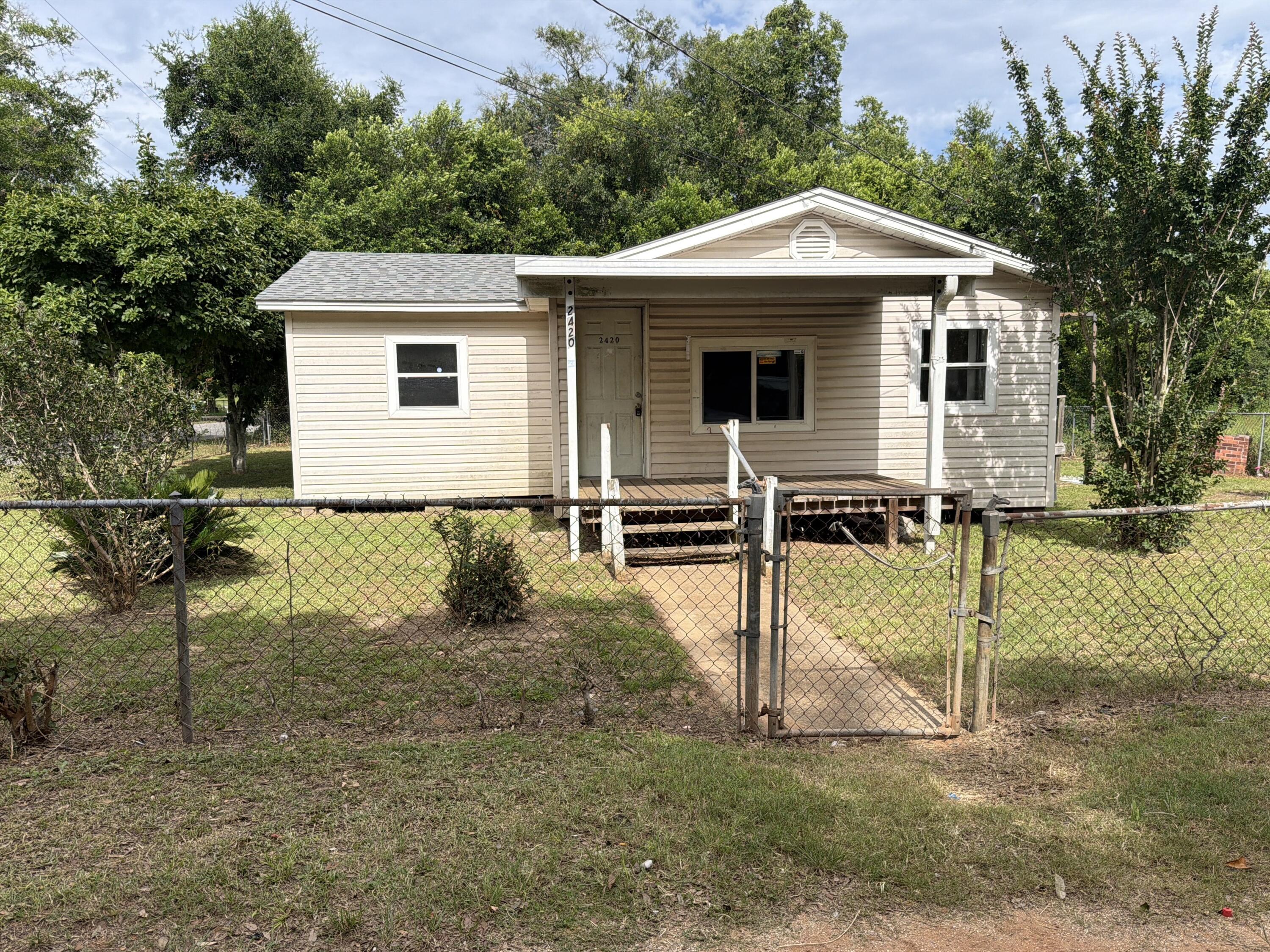 Welcome to your next REO opportunity! Built in 1970, this corner lot home comes with vinyl siding, a fully fenced corner lot and a large storage building. This home has 800sf of living space with 3 bedrooms and 1 bath. Since this home is on a crawlspace, there is tons of potential to make this home your next rental, or first time home. Due to repairs, this home will not qualify for traditional financing; therefore cash or renovation loans only. Call today!