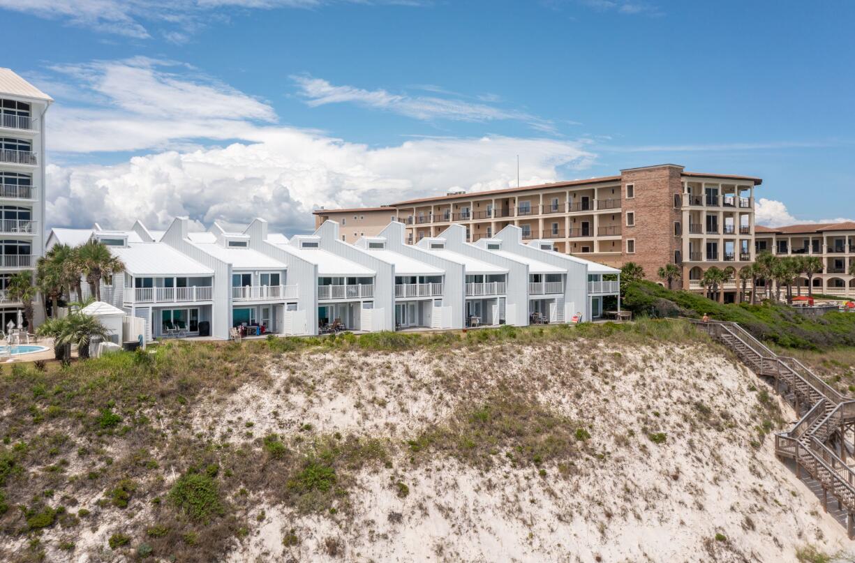 This elegant 2-bedroom, 2.5-bath Gulf-front townhome in Blue Mountain Beach offers a luxurious escape for up to 8 guests. With breathtaking views of the jewel-toned Gulf, this two-story retreat features a private balcony off the primary suite and a patio to enjoy the coastal breeze. The property includes access to a lagoon-style pool above the beach, perfect for freshwater fun. Just steps away, explore local restaurants, art galleries, a bakery, an ice cream parlor, and the county's oldest health food store. Minutes from Gulf Place and Seaside, offering shopping, dining, festivals, and live music. A perfect spot for unforgettable beach vacations and family time.