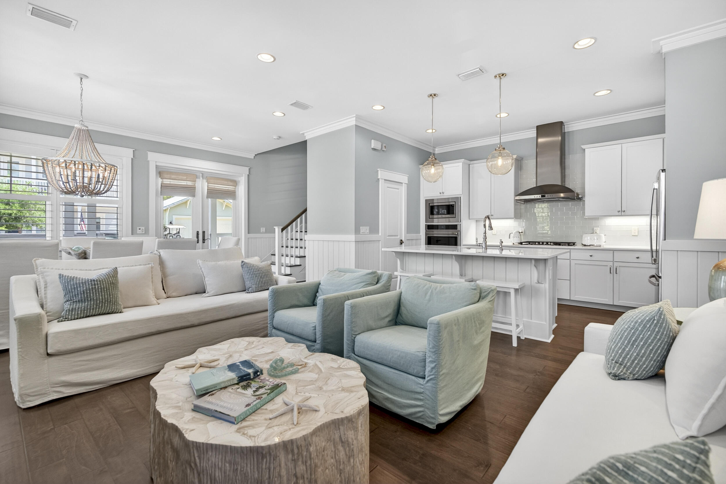 TAKING BACK UP OFFERS. Discover the rare Sea Breeze floor plan on an oversized corner homesite with a one-car garage and the highly coveted upgraded primary suite that includes both a soaking tub and separate shower. This enhanced layout is available only in the newer versions of the Sea Breeze plan, making it an exceptional find. Perfectly positioned on a desirable oversized corner lot, the property offers ample parking and a full-size garage that easily accommodates an SUV or golf cart, complete with epoxy floors and an EV charger outlet for added convenience. Offered fully furnished with designer furnishings, a 2022 Star Sirius luxury street-legal electric golf cart, and three YOLO fat tire beach cruiser bikes, this home is completely turnkey. Just bring your flip flops. Experience classic coastal charm in this beautiful cottage, ideally situated in the sought-after NatureWalk at Seagrove community. A welcoming front porch leads to double entry doors and a spacious, sunlit living and dining area featuring wood floors, shiplap walls, designer lighting, and 5" plantation shutters throughout. The home has been freshly painted, including walls and ceilings, creating a crisp, move-in-ready feel.
The gourmet kitchen is a standout with upgraded counters, tile, and hardware, along with custom white cabinetry, a large center island, and a stylish subway tile backsplash. A full suite of new appliances includes a GE Profile refrigerator, gas cooktop, dishwasher, microwave, and an Electrolux washer and dryer, elevating both function and design. Bathrooms have also been thoughtfully upgraded with enhanced finishes for a cohesive, high-end look.
The first-floor guest bedroom includes tray ceilings and a private ensuite bathroom, providing comfort and convenience for visitors. Upstairs, the expansive primary suite feels like a retreat with its upgraded ensuite bathroom featuring a luxurious soaking tub, separate shower, and dual vanity. Two additional guest bedrooms share a well-appointed bathroom, while a second living space offers flexibility for relaxation or entertainment. Enjoy outdoor living on the screened-in upper porch, perfect for morning coffee or unwinding after a day at the beach.
NatureWalk at Seagrove is beloved by full-time residents and vacationers alike for its prime location, just one mile from the beach and minutes from Seaside and WaterColor, while still offering the serenity of a community surrounded by nature.
Resort-style amenities include the Gathering Place with a zero-entry pool, lap pool, hot tub, firepit, and grilling stations. Additional features include walking trails, a children's playground, a multi-purpose court, and a convenient trail leading directly to the beach.
Do not miss this exceptional opportunity to own a beautifully furnished, fully upgraded Sea Breeze retreat in one of 30A's most desirable communities!