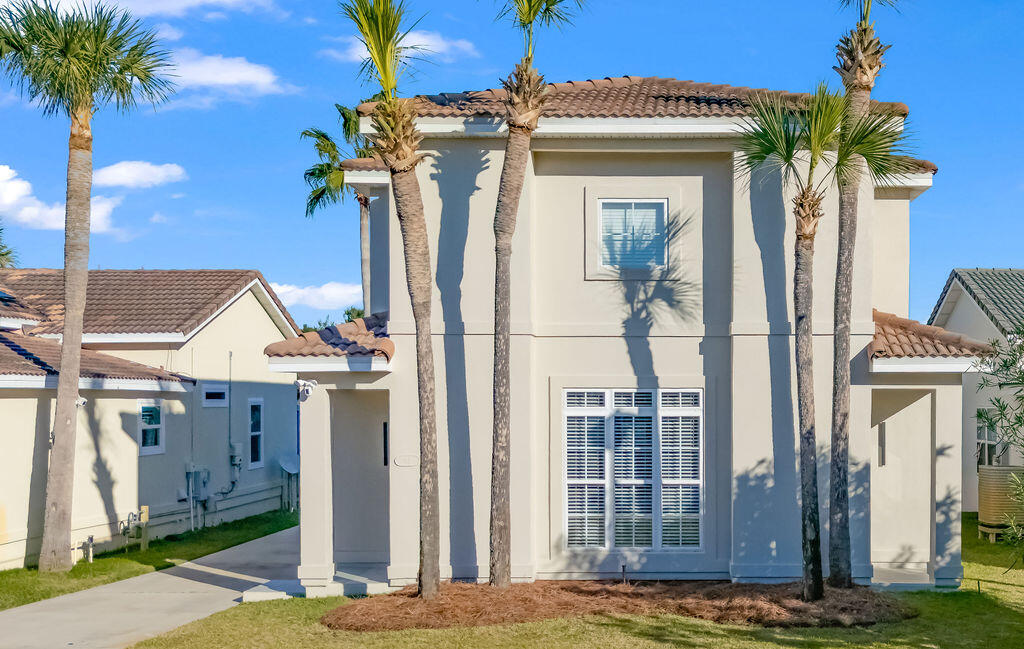 Welcome to gated coastal living just minutes from the sand. Located in an intimate, private community of only 45 homes, this beautifully maintained residence sits just ½ mile from the beach and offers the perfect blend of privacy, space, and coastal convenience. Step inside to soaring 20-foot ceilings that flood the home with natural light and create an open, airy feel from the moment you enter. The kitchen features granite countertops, ample workspace, and a layout ideal for both everyday living and entertaining. Recent updates include fresh interior paint and a new hot water heater. Residents also enjoy access to a community pool, perfect for relaxing after a day at the beach.