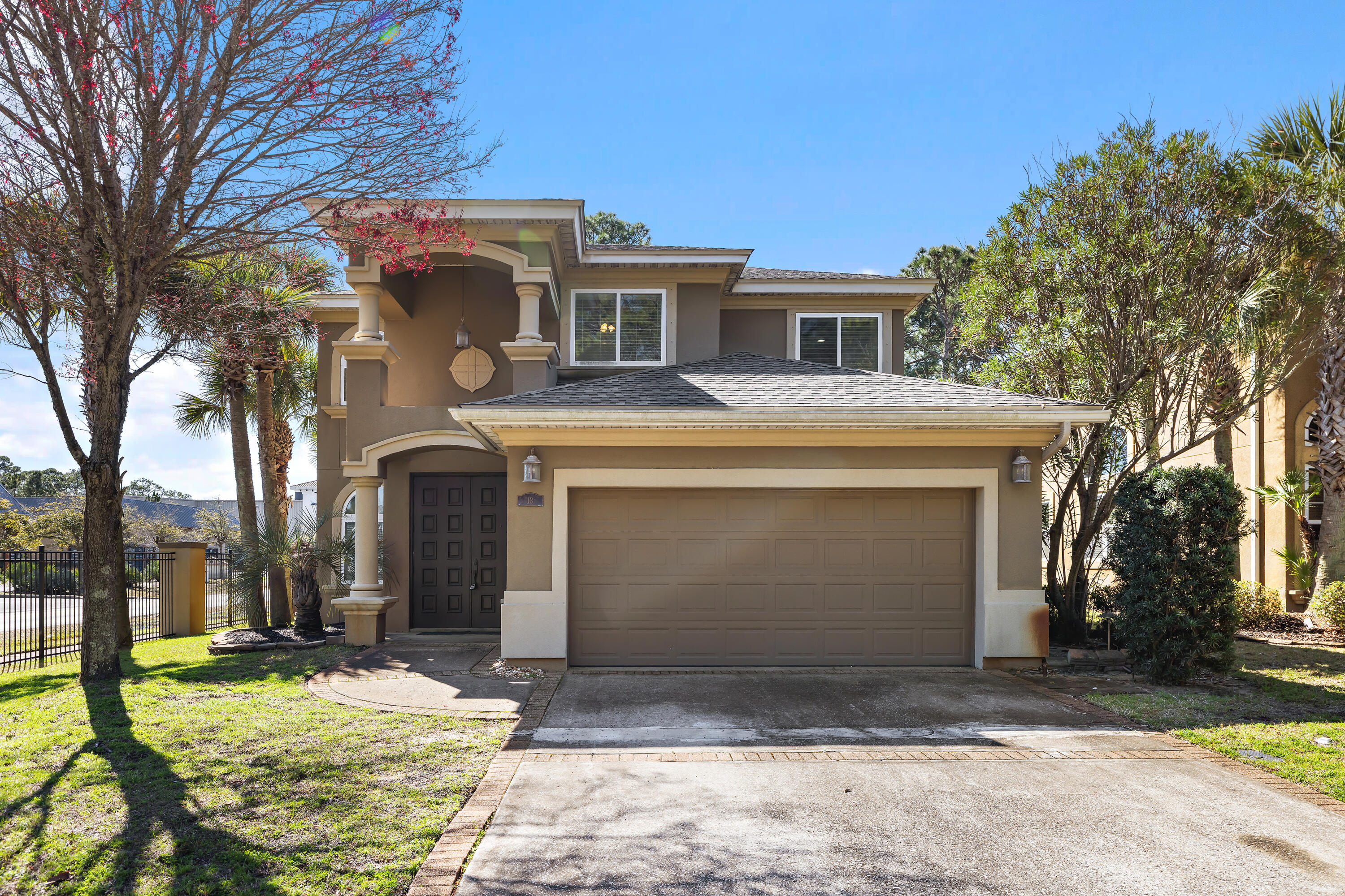 Discover the perfect blend of coastal charm and everyday comfort in this beautifully maintained home located in the desirable Baywalk Landing community of Miramar Beach. Just one mile to the sugar-white sands of the Gulf at the South Walton Beach Access, premier dining, and upscale shopping of the Silver Sands Premium Outlets, this home also offers the rare bonus of being only a short block from the bay and scenic Legion Park.
Built in 2006, this two-story Mediterranean-style residence offers timeless appeal. Inside, you will find thoughtful upgrades throughout, including travertine flooring, rich cherry cabinetry, granite countertops, and stainless steel appliances. The spacious and flexible floor plan is designed for both entertaining and daily living, featuring two living areas, two dining spaces, and an open-concept kitchen that serves as the heart of the home. Upstairs, all four bedrooms provide privacy and comfort, including a generously sized primary suite complete with a spa-like bathroom retreat. And, outside you will enjoy a fully fenced backyard with a covered patio.