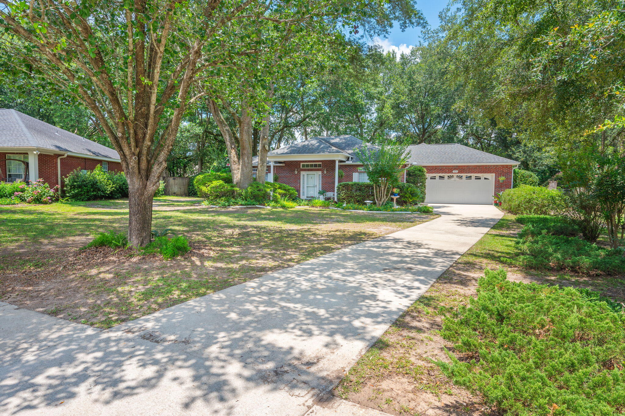 Welcome to this exceptional all-brick home located in one of North Crestview. Situated on the quiet cul-de-sac of Hilary Street, this property offers privacy, convenience,established trees, and surrounding pride of ownership with beautifully maintained homes throughout the area.

Conveniently located just minutes from grocery stores, schools, shopping, local military bases, and the beautiful Emerald Coast beaches, the location offers both comfort and accessibility.

Positioned on a nicely shaded, level lot, the exterior features inviting curb appeal with a covered front porch, fully fenced backyard with wood privacy fencing, and an enclosed rear sunroom perfect for relaxing or entertaining year-round.

Inside, you'll appreciate the thoughtful design and quality finishes including raised ceilings, crown molding, tile and wood laminate flooring throughout most of the home, with carpeting in the primary suite for added comfort. The oversized kitchen features granite countertops, abundant cabinetry, and ample workspace ideal for everyday living.

Major updates include a 2019 roof, 2021 water heater, 2022 HVAC system, and drainfield replaced in 2009 ( Septic Pumped July 2026), offering peace of mind for years to come. A beautifully maintained home combining quality, comfort, and an exceptional location.