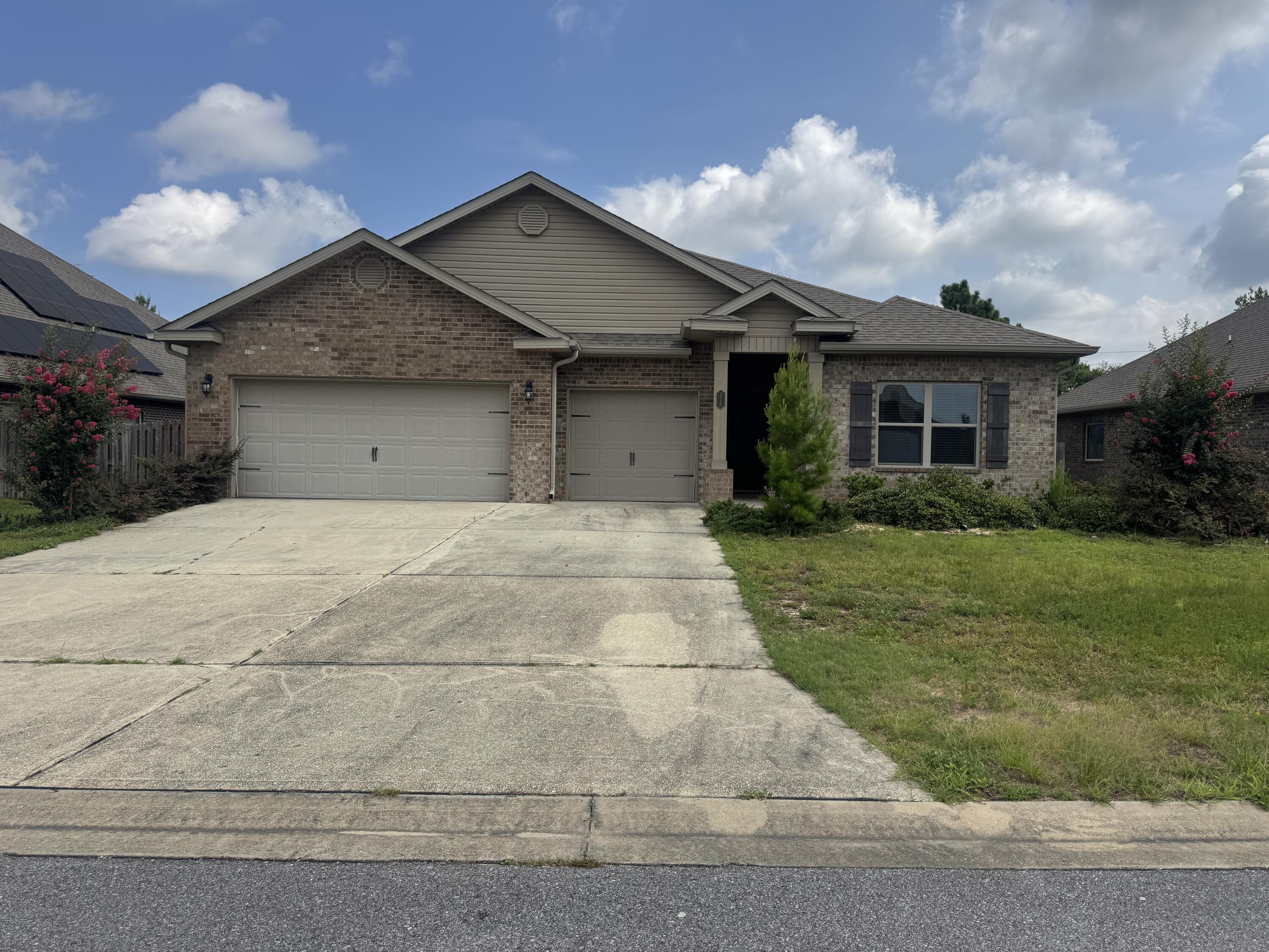 Welcome to desired Redstone Commons community. This home will greet you with an open floor plan, With 4 bedrooms, 3.5 bathrooms, and 3 car front entry garage, this home will offer space for your whole family. The covered back porch leads to a stunning pool. The great outdoor space to relax and entertain! playground, clubhouse, and dog park,  Redstone Commons is located directly across from Riverside Elementary and Shoal River Middle School. I-10, beautiful Emerald Coast beaches & Eglin AFB are only a short drive away.