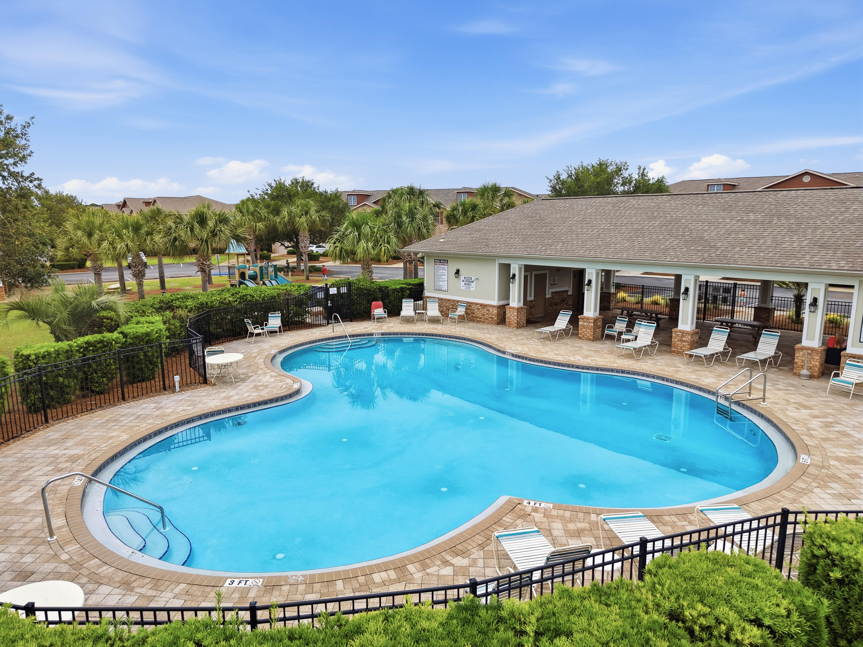 ASSUMABLE VA LOAN AVAILABLE WITH A 2.62% INTEREST RATE! Located in the Reserve Pointe community in East Navarre, this 3-bedroom, 2.5-bath townhome offers low-maintenance living approximately 4 miles from Navarre Beach and about 15 minutes to Hurlburt Field AFB. This particular unit stands out with manicured landscaping and enhanced curb appeal featuring mature greenery, sculpted shrubs, privacy hedging, and decorative mulch accents surrounding the front entry. 

The HOA covers exterior building insurance and weekly grounds maintenance, contributing to the ease of ownership and low-maintenance lifestyle this community is known for.  Hurricane window protection panels will also convey with the property.

Positioned near the front of the community, this unit offers convenient access to the community pool, playground, sidewalks, guest parking, and mailboxes. Reserve Pointe is a pet-friendly neighborhood where residents regularly walk pets throughout the community, children ride bikes, and school bus service stops nearby.

Inside, the home features an open-concept living and dining layout with abundant natural light flowing from the living room windows into the main living areas and kitchen. Granite countertops are featured throughout the kitchen and bathrooms. The downstairs half bath includes an undermount sink, while both full bathrooms are located upstairs for added functionality and privacy. The kitchen features raised-panel cabinetry with crown molding & granite countertops. ....breakfast bar seating, and an open layout overlooking the main living and dining areas.

Upstairs, the primary suite overlooks the front of the property and includes a walk-in closet and private bathroom with double granite vanities and a step-in shower. The two additional bedrooms overlook the backyard area. The upstairs laundry closet adds everyday convenience.

Conveniently located near shopping, restaurants, schools, medical facilities, and everyday essentials, this property is well suited for a primary residence, second home, or investment opportunity.