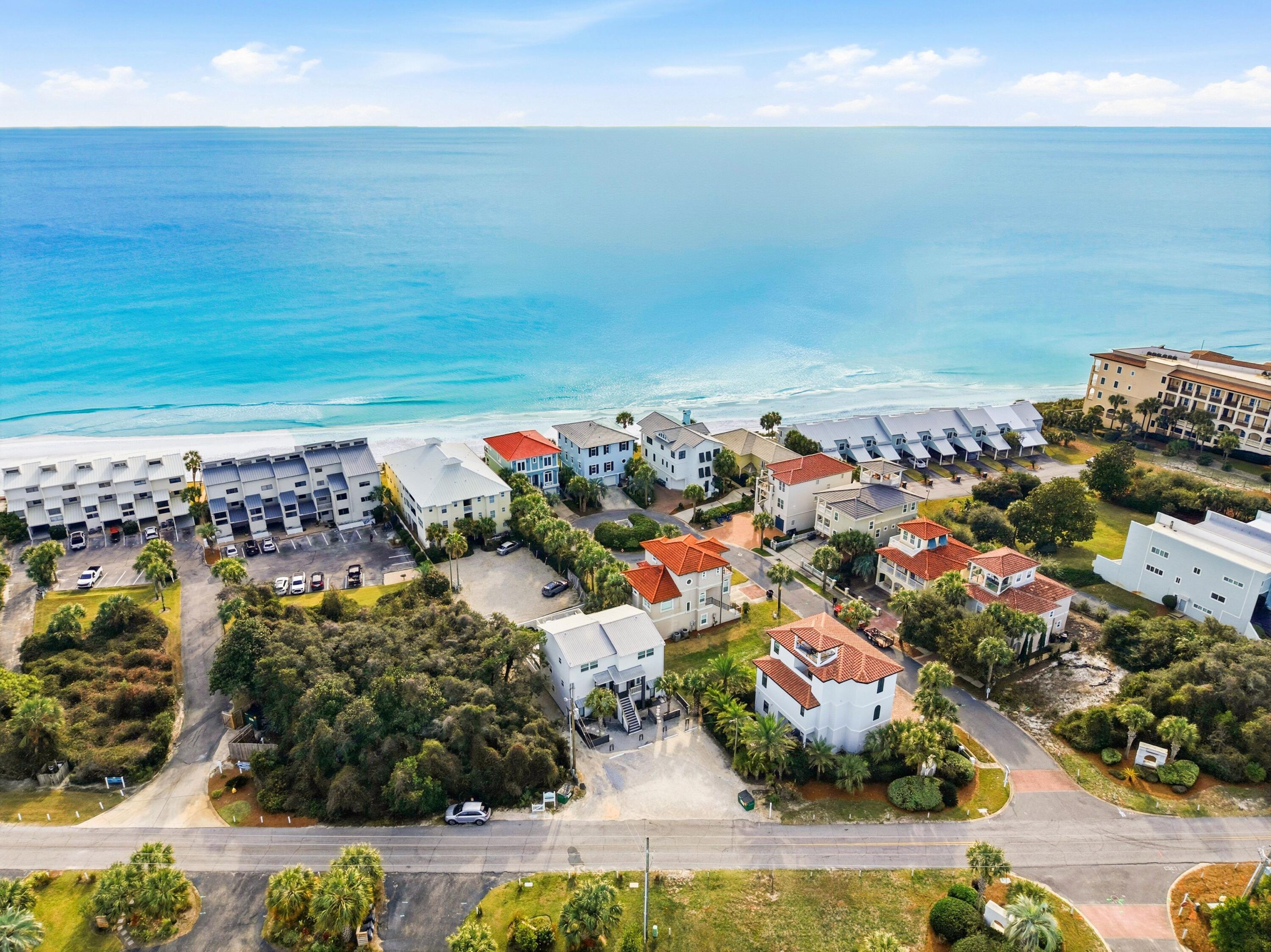Located in the heart of Blue Mountain Beach, this fully renovated quadplex offers four units totaling six bedrooms and six bathrooms. The property includes two one-bedroom units and two two-bedroom units.