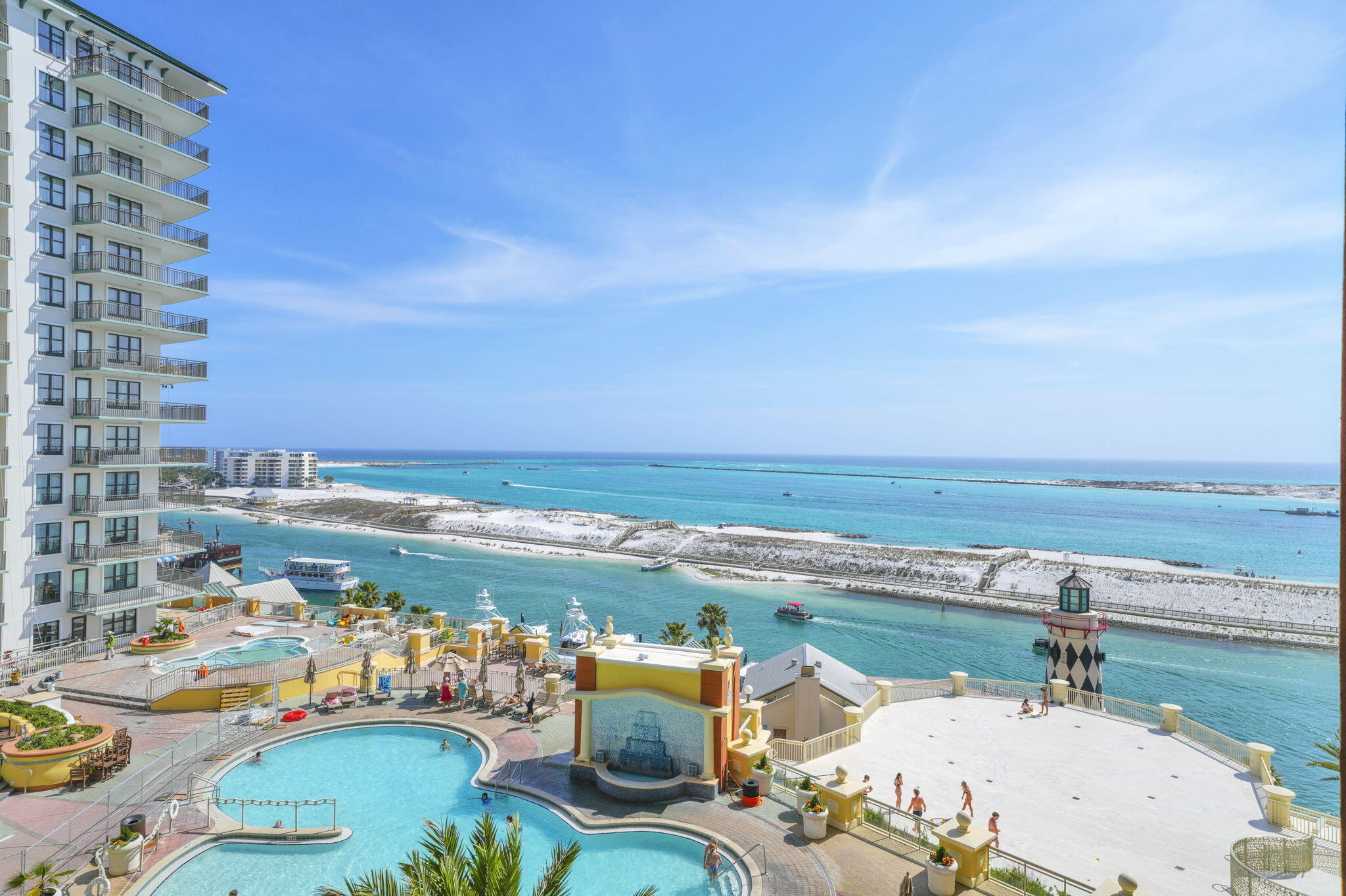 Front-row seats to some of the most breathtaking waterfront views in Destin. This 5th-floor Emerald Grande residence features 2 bedrooms plus a bunk area and overlooks the Destin Harbor, East Pass, and the emerald waters of the Gulf--creating the kind of panoramic backdrop buyers search for when looking for a luxury condo in Destin with water views. From sunrise coffee to unforgettable sunsets, the oversized balconies were designed to soak it all in, with one off the main living area and a second private balcony connected to the primary suite.
Inside, the open-concept layout is ideal for relaxing after a day on the water or entertaining guests before heading downstairs to HarborWalk Village. Located in the heart of Destin, you are just steps from waterfront dining, shopping, boating, fishing, live entertainment, and private beach shuttle service to the sugar-white sand along East Pass. Whether you are searching for a Destin vacation home, waterfront condo, second home, or income-producing investment property with rental history, this Emerald Grande condo delivers location, lifestyle, and unforgettable views all in one package.