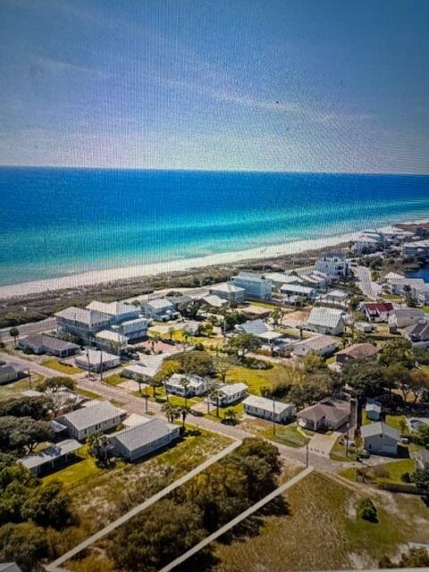 Come see one of the few buildable Sunnyside beach lots where impact fees have been paid for a 4 bath home. Enjoy 3000 feet of private beach shared by less than 100 home sites. Just steps to the beach with no HOA fees, No buildout time, No design approval needed and short term rentals are allowed. All of this located on a cut de sac so no drive thru traffic.