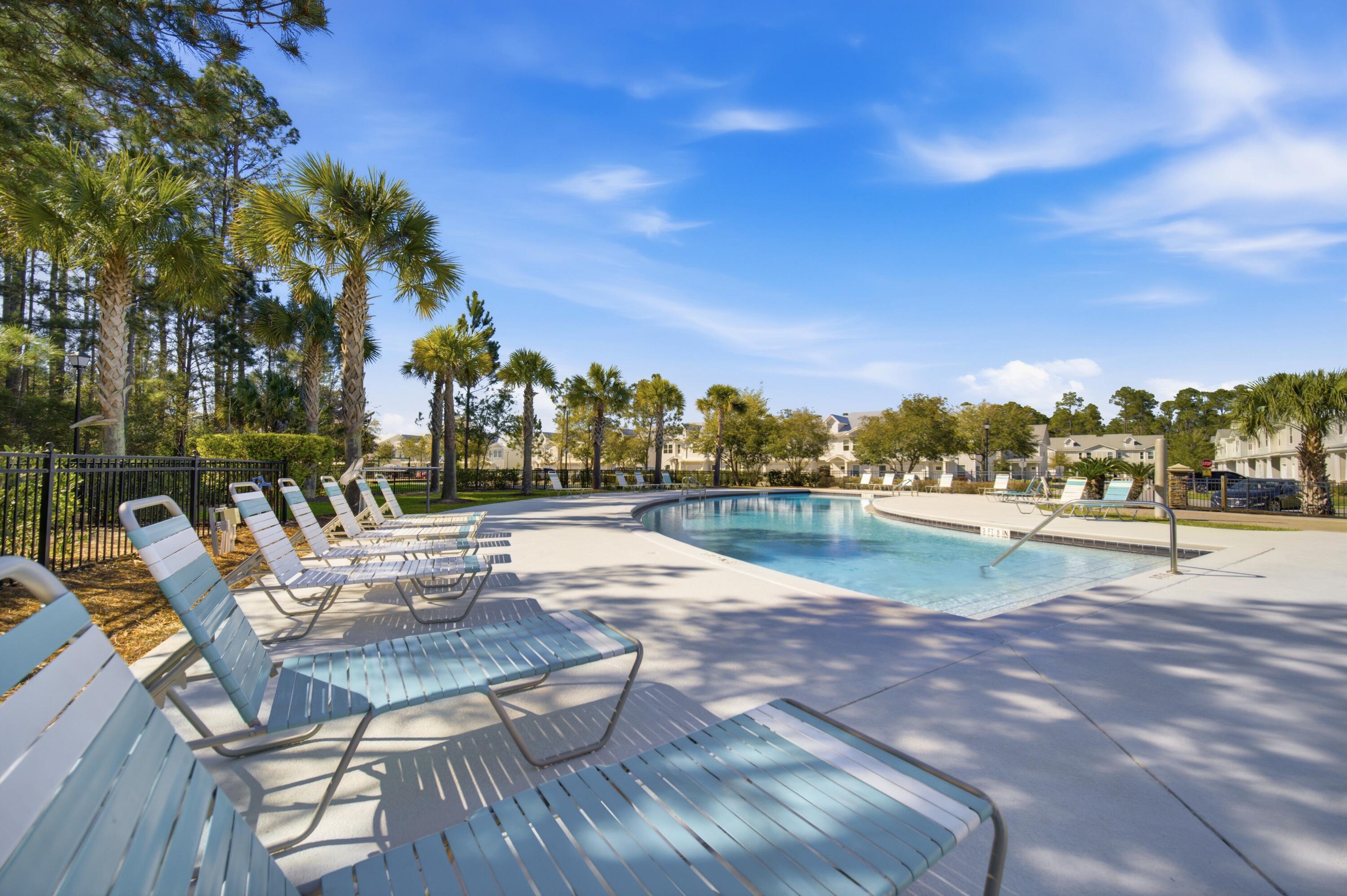 Welcome to The Verandas of Freeport, where comfort, convenience, and modern coastal living come together in one beautifully maintained end-unit townhome. Built in 2022, this spacious 3-bedroom, 2.5-bath residence offers approximately 1,521 square feet of thoughtfully designed living space and is ideally located just minutes from shopping, dining, schools, and the world-famous white sand beaches of the Emerald Coast.

Step inside to discover an inviting open-concept floor plan filled with natural light. As an end unit, this home benefits from additional windows that create a bright and airy atmosphere while providing added privacy. The spacious living and dining areas flow seamlessly into the well-appointed kitchen, making the home perfect for both everyday living and entertaining guests. The kitchen features beautiful quartz countertops, stainless steel appliances, ample cabinetry, and generous counter space designed to accommodate everything from quick meals to holiday gatherings. Luxury vinyl plank flooring throughout the main living areas adds both style and durability. Upstairs, the generously sized primary suite offers a peaceful retreat with a private ensuite bathroom and spacious closet. Two additional bedrooms provide flexibility for family members, guests, a home office, or hobby space. A full guest bathroom and convenient upstairs laundry area complete the second level, creating a functional layout that maximizes comfort and convenience.

One of the standout features of this home is the covered and screened rear porch, providing the perfect space to enjoy morning coffee, unwind after a long day, or entertain friends while enjoying Florida's beautiful weather. Whether you're seeking a primary residence, second home, or investment opportunity, this property offers low-maintenance living in a growing and highly desirable location.

Residents of The Verandas enjoy access to community amenities including a neighborhood pool and professionally maintained common areas. The community's location provides easy access to Highway 331 and Highway 20, making travel to Santa Rosa Beach, 30A, Destin, Niceville, and surrounding areas simple and convenient. Enjoy being close to beaches, parks, boating, fishing, shopping, restaurants, and everything the Emerald Coast lifestyle has to offer.

Move-in ready and exceptionally maintained, this beautiful townhome presents an outstanding opportunity to own in one of Freeport's fastest-growing communities. Schedule your private showing today and discover why so many buyers are choosing to call The Verandas of Freeport home.