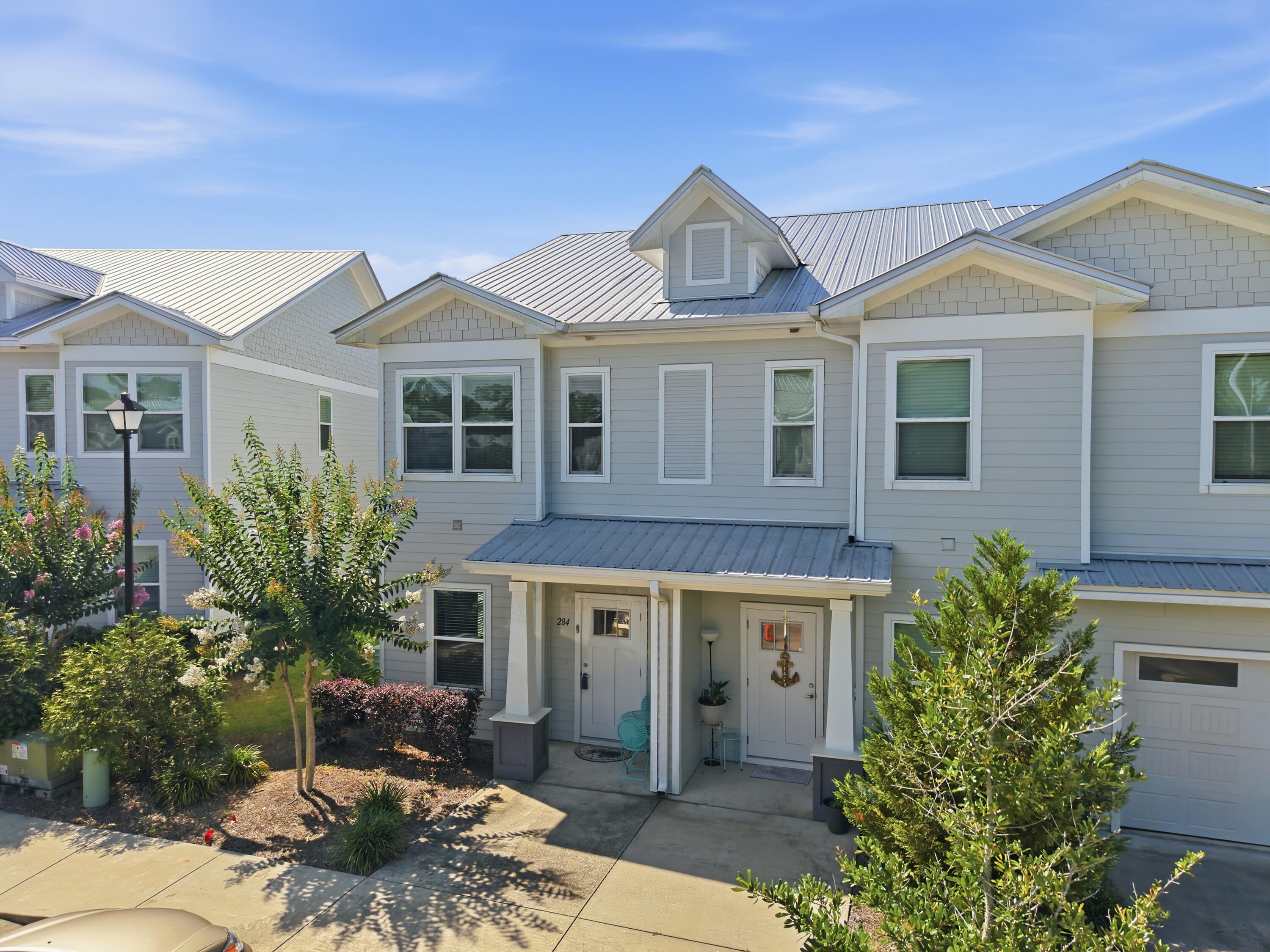 Welcome to The Verandas of Freeport, where comfort, convenience, and modern coastal living come together in one beautifully maintained end-unit townhome. Built in 2022, this spacious 3-bedroom, 2.5-bath residence offers approximately 1,521 square feet of thoughtfully designed living space and is ideally located just minutes from shopping, dining, schools, and the world-famous white sand beaches of the Emerald Coast.

Step inside to discover an inviting open-concept floor plan filled with natural light. As an end unit, this home benefits from additional windows that create a bright and airy atmosphere while providing added privacy. The spacious living and dining areas flow seamlessly into the well-appointed kitchen, making the home perfect for both everyday living and entertaining guests. The kitchen features beautiful quartz countertops, stainless steel appliances, ample cabinetry, and generous counter space designed to accommodate everything from quick meals to holiday gatherings. Luxury vinyl plank flooring throughout the main living areas adds both style and durability. Upstairs, the generously sized primary suite offers a peaceful retreat with a private ensuite bathroom and spacious closet. Two additional bedrooms provide flexibility for family members, guests, a home office, or hobby space. A full guest bathroom and convenient upstairs laundry area complete the second level, creating a functional layout that maximizes comfort and convenience.

One of the standout features of this home is the covered and screened rear porch, providing the perfect space to enjoy morning coffee, unwind after a long day, or entertain friends while enjoying Florida's beautiful weather. Whether you're seeking a primary residence, second home, or investment opportunity, this property offers low-maintenance living in a growing and highly desirable location.

Residents of The Verandas enjoy access to community amenities including a neighborhood pool and professionally maintained common areas. The community's location provides easy access to Highway 331 and Highway 20, making travel to Santa Rosa Beach, 30A, Destin, Niceville, and surrounding areas simple and convenient. Enjoy being close to beaches, parks, boating, fishing, shopping, restaurants, and everything the Emerald Coast lifestyle has to offer.

Move-in ready and exceptionally maintained, this beautiful townhome presents an outstanding opportunity to own in one of Freeport's fastest-growing communities. Schedule your private showing today and discover why so many buyers are choosing to call The Verandas of Freeport home.