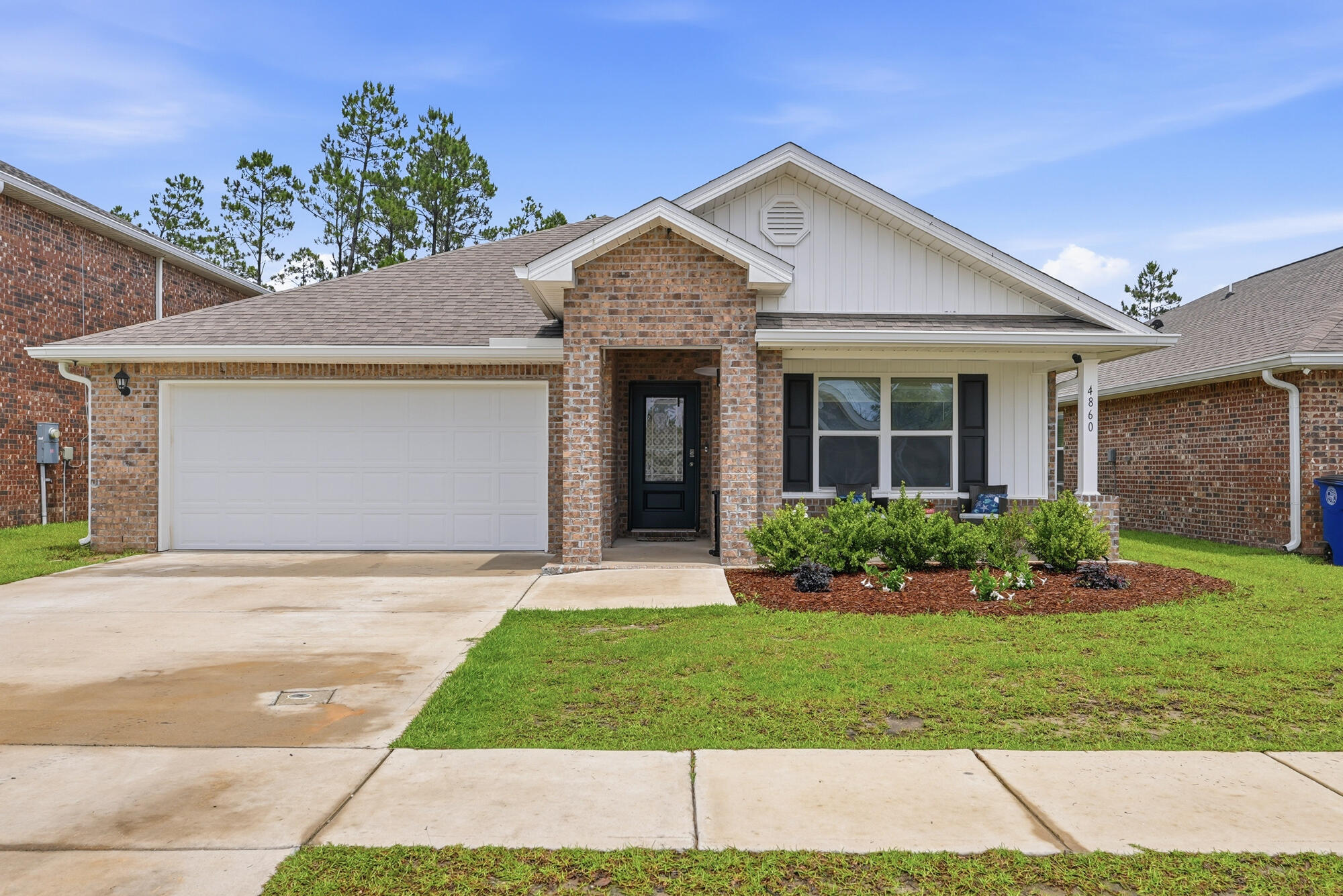 How would you like to not only have a new house but to also have a COMMUNITY PLAYGROUND? That's right, this house in a neighborhood that features TWO CLUBHOUSES that includes a FITNESS CENTER, POOL, TENNIS COURT, BASKETBALL COURT, and PLAYGROUND.

While we know that there are plenty of new construction homes available, you can have this FOUR BEDROOM and TWO BATH house at 1,827 square feet (per property appraiser site) for a LOWER PURCHASE PRICE than an average new build in this neighborhood at similar square footage. If that is not enough, the home features a CALI FLOOR PLAN featuring an open common area including the KITCHEN, LIVING ROOM, and DINING while preserving some privacy with the BEDROOMS being located towards the front of the house, except the MASTER SUITE.

The KITCHEN features an ISLAND with cabinets throughout the kitchen space along with a GLASSTOP STOVE, BUILT IN MICROWAVE, DISHWASHER, and PANTRY.

The MASTER SUITE features a MASTER BEDROOM and a MASTER BATHROOM with DOUBLE VANITIES, GARDEN TUB, WALK-IN SHOWER, and WALK-IN CLOSET.

Other features include a TWO CAR GARAGE, A FRONT PORCH, and BACK PORCH along with the backyard facing the woods for more privacy.

COME GET YOUR LIBERTY HOME FOR LESS TODAY!