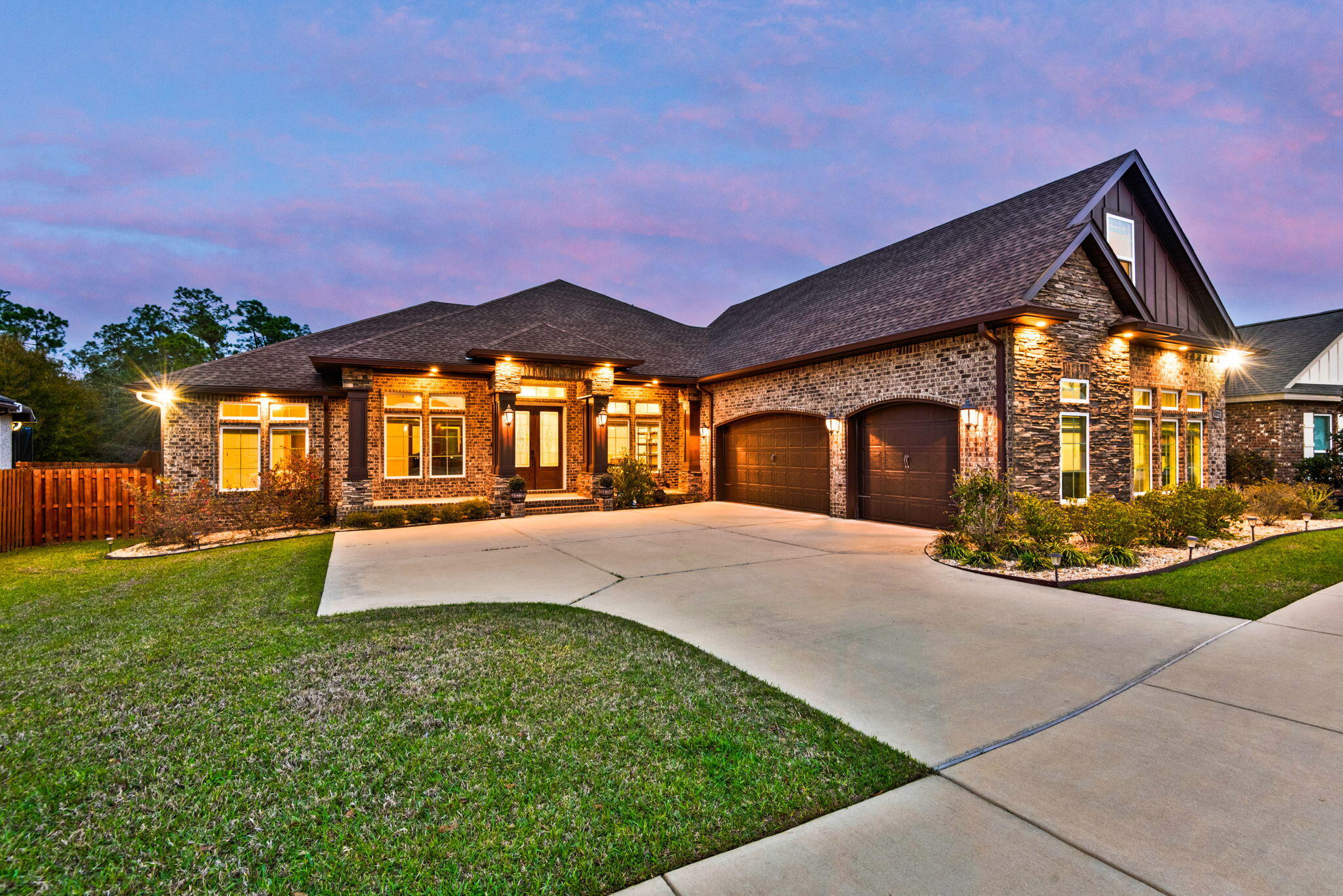 Discover luxury living in this stunning 4 bed/3.5 bath custom-built home featuring exquisite craftsmanship throughout. Located in the highly sought-after Huntington Creek gated community, this home has been thoughtfully designed with stylish design throughout to include 10' custom ceilings, crown molding, lighting and wainscotting. If outdoor living is what you're after, this home has it in spades with a heated saltwater pool & spa, large covered patio, outdoor kitchen and outdoor fireplace.  Indoors is an entertainer's dream, featuring a chef's kitchen, large great room with fireplace and custom built in book cases, formal dining room and a bonus games room/home theater. The first-floor master suite is a sanctuary from the everyday featuring a generous bedroom with 2 walk-in closets and a spa inspired master bath with soaking tub, custom shower and oversized dual vanity. Guests or family will also be pleased as each guest room has its own bathroom.  Homes like this don't last...make your appointment to all in love with this beautiful home today!