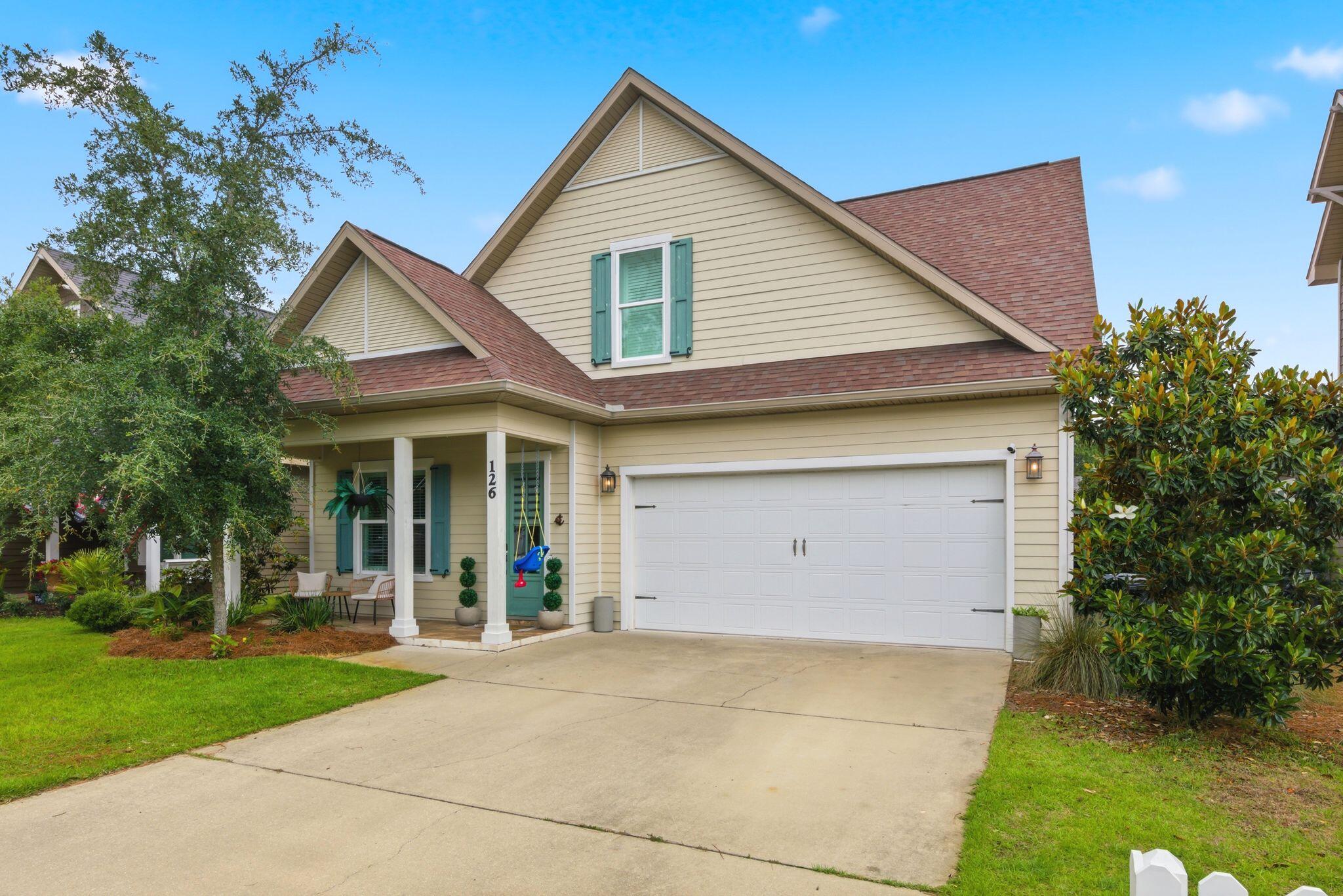 Experience coastal living in the highly sought-after Paradise Cove community! This Boswell-built home is just 5 minutes from 30A, Seaside, and new Walton County schools. Offering 4 bedrooms, 2.5 baths, plus a large bonus room currently used as a 5th bedroom, this home is designed for comfort and functionality. Features include 10' ceilings, crown molding, upgraded trim, a fireplace, and a spacious first-floor primary suite with a garden tub and oversized tiled shower. Upgrades include impact windows, plantation shutters, designer lighting, gutters, screened porch, fenced yard, paver patio, outdoor kitchen, partially turfed back yard, and a deep 2-car garage with an 8' door. Located on a quiet street across from the community pool. No short-term rentals allowed.