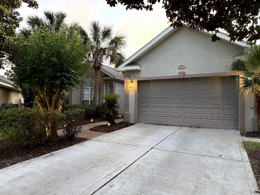Welcome to 226 Talquin Cove! This beautiful one-story home is located on a cul-de-sac in the coveted Emerald Lakes subdivision. This gated community is peaceful, serene, convenient to everything, and one of the few located in Destin with no city taxes.

This thoughtfully designed, lake-view retreat has an open floor plan, high ceilings, and a private, fenced-in back yard. The kitchen is open to the living and dining room and features beautiful Cambria counter tops, Jenn-Air gas cooktop, a built-in eating nook, lots of cabinet space, and wrap-around bar top. Perfect for entertaining family and friends.

The large living room has lit, built-in display shelves and entertainment center, remote controlled gas fireplace, in-ceiling speakers, and plenty of room for seating. Great for movies or just relaxing.

The Florida room provides an additional 300sq/ft of conditioned space and features large sliding windows, mini-split AC, ceiling fans, pre-wired speakers, view of the lake, and access to the patio and yard.

The large master suite is tucked away in the rear corner of the house. It has lots of natural light, tray ceilings, separate shower and garden tub, double vanities, new Closets by Design closet, dimmable lighting, and glass sliding door that leads to the side patio.

Additional bedrooms have new carpet and paint. They share a semi-ensuite bathroom and are located at the front of the house, giving your kids or guests privacy, with an additional half bath in the foyer.

Yard