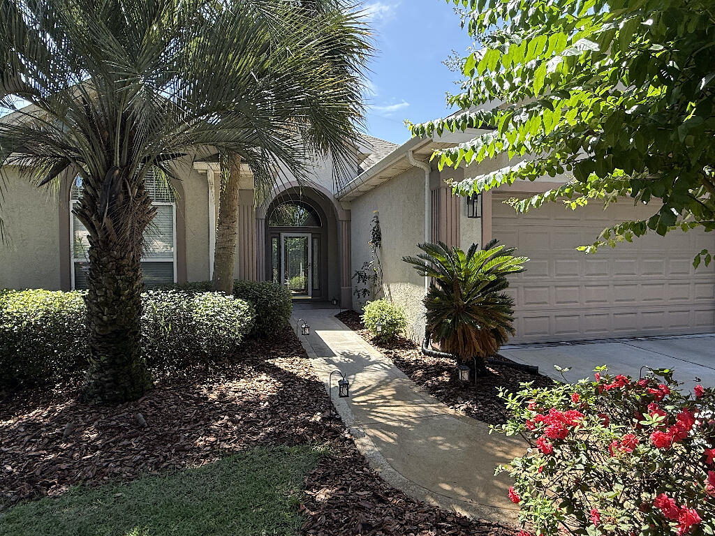 Welcome to 226 Talquin Cove! This beautiful one-story home is located on a cul-de-sac in the coveted Emerald Lakes subdivision. This gated community is peaceful, serene, convenient to everything, and one of the few located in Destin with no city taxes.

This thoughtfully designed, lake-view retreat has an open floor plan, high ceilings, and a private, fenced-in back yard. The kitchen is open to the living and dining room and features beautiful Cambria counter tops, Jenn-Air gas cooktop, a built-in eating nook, lots of cabinet space, and wrap-around bar top. Perfect for entertaining family and friends.

The large living room has lit, built-in display shelves and entertainment center, remote controlled gas fireplace, in-ceiling speakers, and plenty of room for seating. Great for movies or just relaxing.

The Florida room provides an additional 300sq/ft of conditioned space and features large sliding windows, mini-split AC, ceiling fans, pre-wired speakers, view of the lake, and access to the patio and yard.

The large master suite is tucked away in the rear corner of the house. It has lots of natural light, tray ceilings, separate shower and garden tub, double vanities, new Closets by Design closet, dimmable lighting, and glass sliding door that leads to the side patio.

Additional bedrooms have new carpet and paint. They share a semi-ensuite bathroom and are located at the front of the house, giving your kids or guests privacy, with an additional half bath in the foyer.

Yard