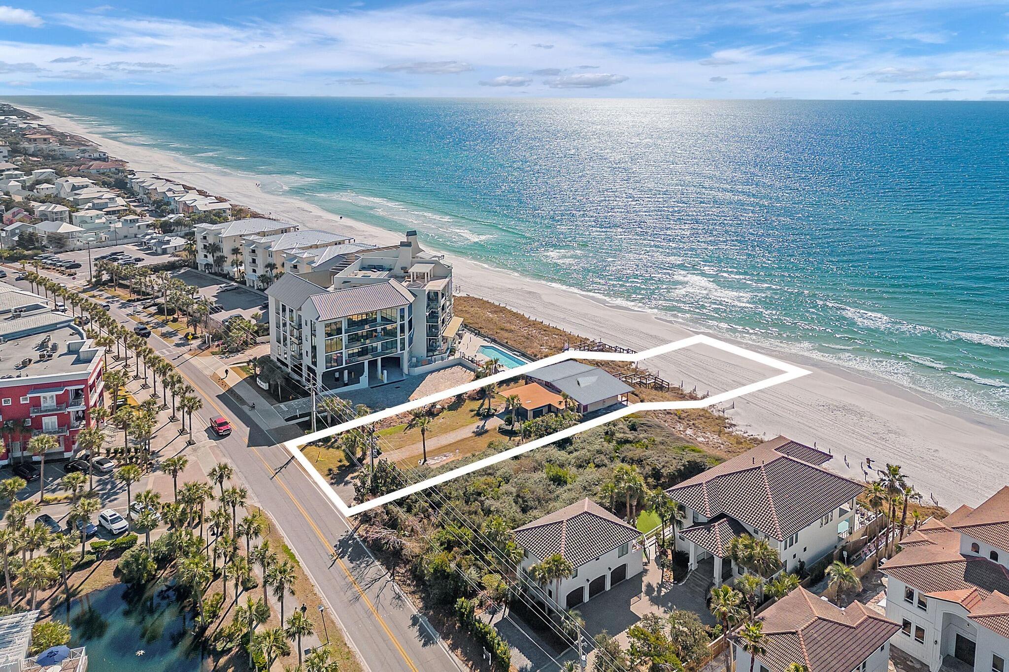 PRIME LOT WITH 75 FT OF BEACH/GULF FRONTAGE TO THE MHWL! Prime 30A Beachfront Lot located across from Gulf Place at 393 & 30A!This premium Gulf Front Lot has 75 Feet of beachfront, with sweeping views of the pristine white sands and emerald waters! This is the perfect opportunity to build your custom beachfront home on this premium 75-foot Gulf front lot in the heart of Santa Rosa Beach. Located along Scenic Highway 30A and just steps to Gulf Place, enjoy easy access to dining, shopping, and the area's relaxed coastal vibe. This .56-acre property offers endless  possibilities and forever views of sugar-white sand and emerald Gulf waters. Currently home to a 1960s structure the lot is ideal for redevelopment, making memories with your family/friends for years to come. Experience one