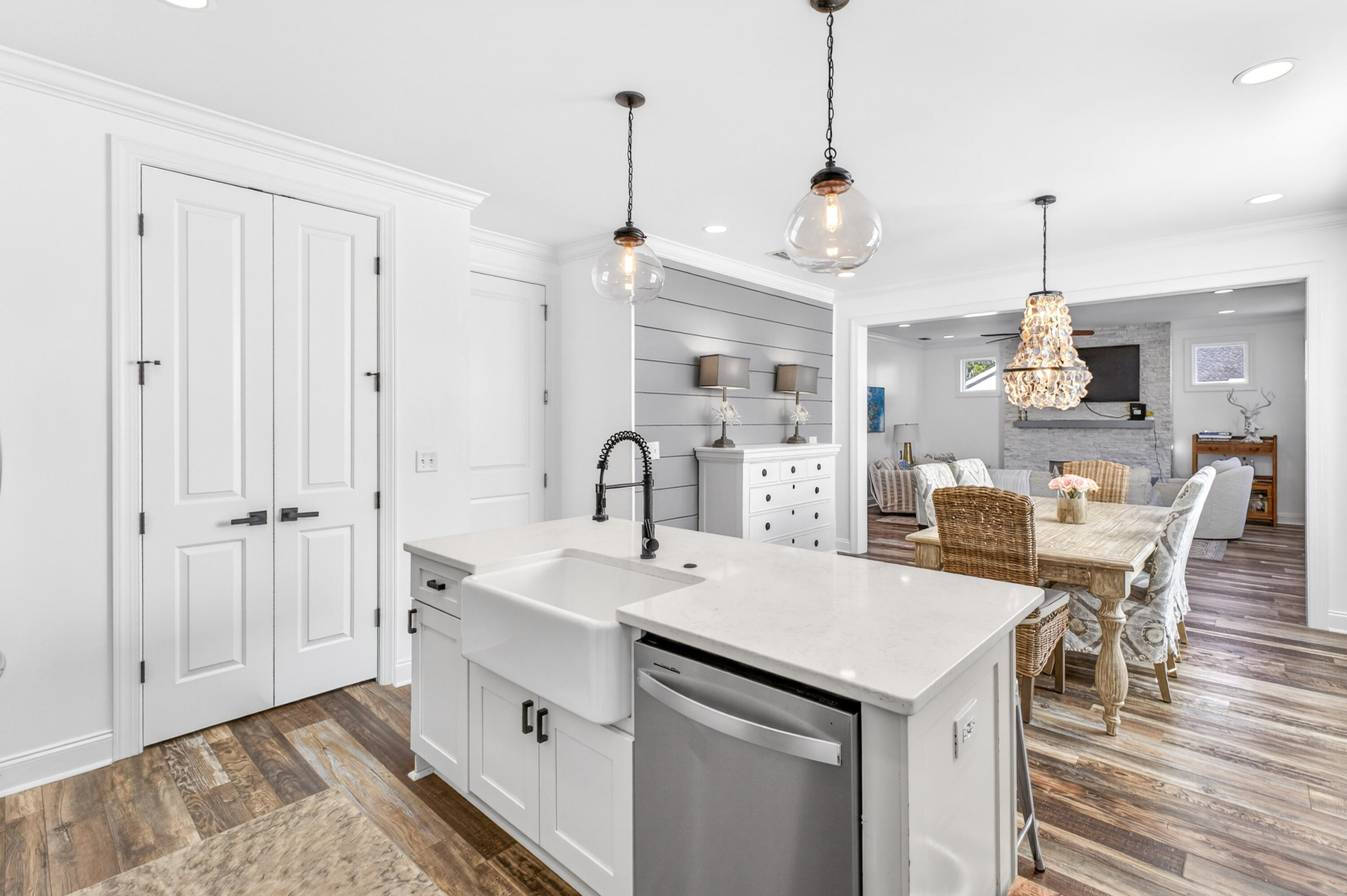 JUST REDUCED! UPGRADED AND UPDATED! This 2,348 SF corner-lot home offers 4 bedrooms, 3.5 baths, two primary suites, a garage, and an upstairs second living area. Features include shiplap accents, quartz countertops, and a chef's kitchen with large island, stainless steel appliances, farmhouse sink, and pantry. Enjoy a private backyard with pergola and ambient lighting. The new traffic light at the Hwy 98 and Church Street intersection adds everyday convenience. Church Street Village amenities include a community pool, fitness center, playground, dog park, and lawn maintenance included in HOA dues. Just minutes to the white-sand beaches, shopping, dining, and attractions of Scenic 30A, Grand Boulevard, and Sandestin. Call to schedule your showing today and start living your Emerald Coast lifestyle.