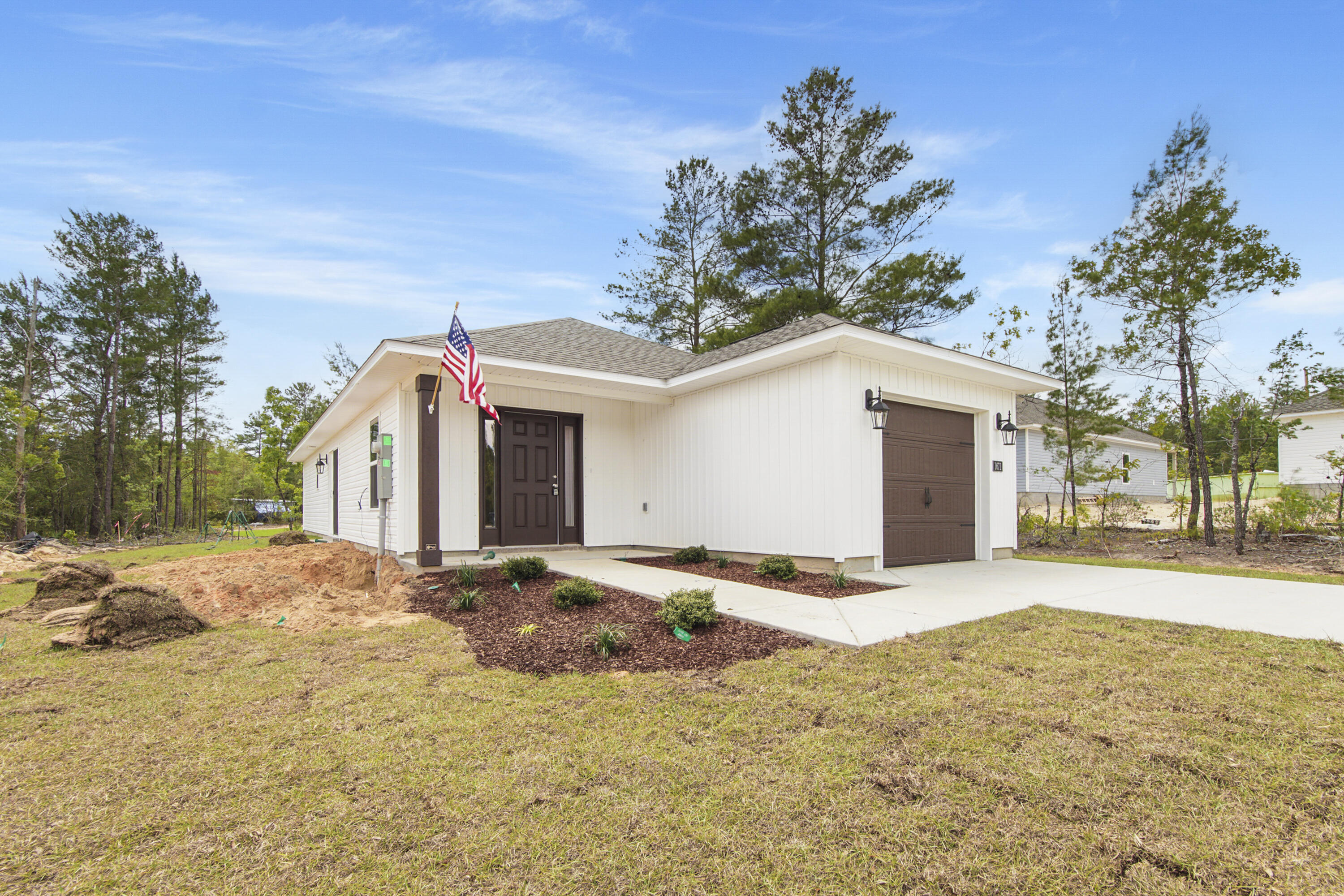 Fresh, simple, and easy to love. This newly built home by Flynn Built offers 3 beds and 2 baths plus a single car garage, with a light, open layout that feels comfortable and livable. Inside, you'll find durable LVP flooring, granite countertops throughout, stainless appliances and a bright, airy feel that makes the space live larger than expected. The exterior features low-maintenance vinyl siding, making upkeep easy. Also included is a one-year builder warranty for added peace of mind. Plus, with a full-price offer, buyers receive $6,000 toward closing costs, making this a super option for first-time buyers, those downsizing, or anyone looking for a clean, move-in ready start.
