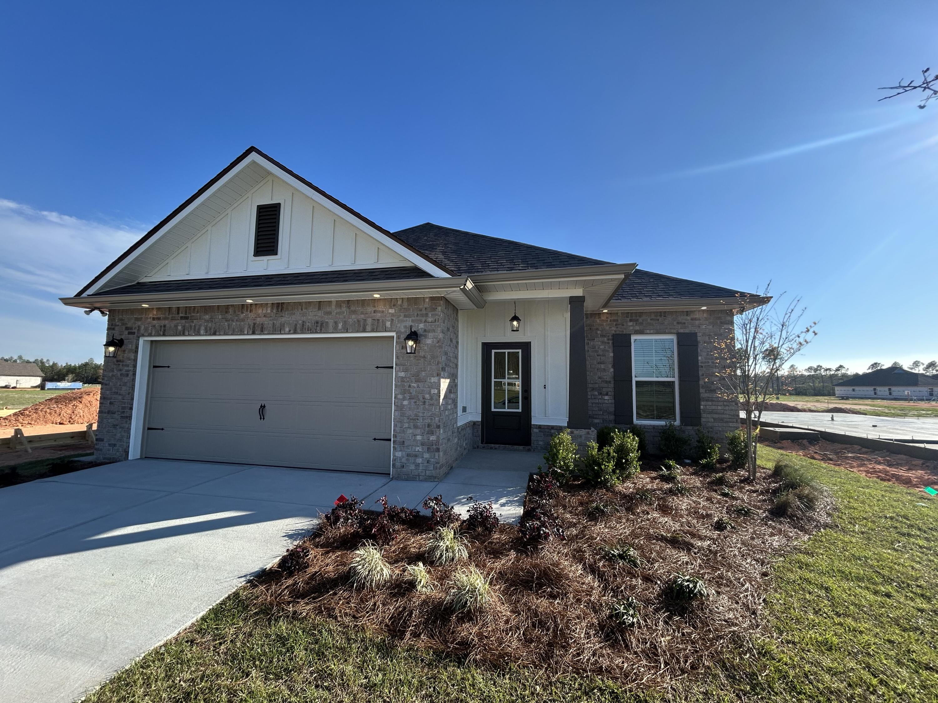 The DOGWOOD IV J in Natureview community offers a 3BR/2BA, open design. Upgrades added (list attached). Special Features: double vanity, garden tub, separate custom tiled shower, and 2 walk-in closets in master bath, kitchen island, walk-in pantry, covered porches, undermount sinks, custom kitchen backsplash, LED lighting, crown molding, ceiling fan in living and master, framed mirrors in all baths, smart connect WIFI thermostat, framed mirrors in baths, landscaping, architectural 30-year shingles, flood lights, and more! Energy Efficient Features: water heater, electric kitchen appliance package, vinyl low E windows, and more! Energy Star Partner.