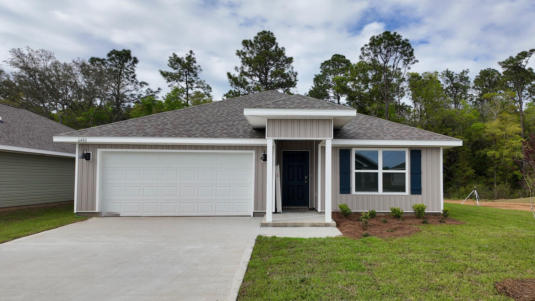 Welcome to Rivers Cove featuring a beautiful community pool and playground. The Cali model, one of our most sought-after designs, offers a fantastic open layout for relaxed living. Offers 4 bedrooms, 2 bathrooms, a covered back patio, 2-car garage, and the 'Smart Home Connect' System with various convenient Smart Home devices. The well-appointed kitchen includes stainless steel appliances, a smooth-top range, built-in microwave, quiet dishwasher, corner pantry, island bar, eye-catching wood-look flooring, and plush carpet in the bedrooms. Bedroom 1 and the adjoining beautiful bath boast a large walk-in closet, double vanity sinks and more. Fabric Hurricane window and door protection is also included. ALL LISTING pictures, colors, features, and size may vary. Square footages are approximate.