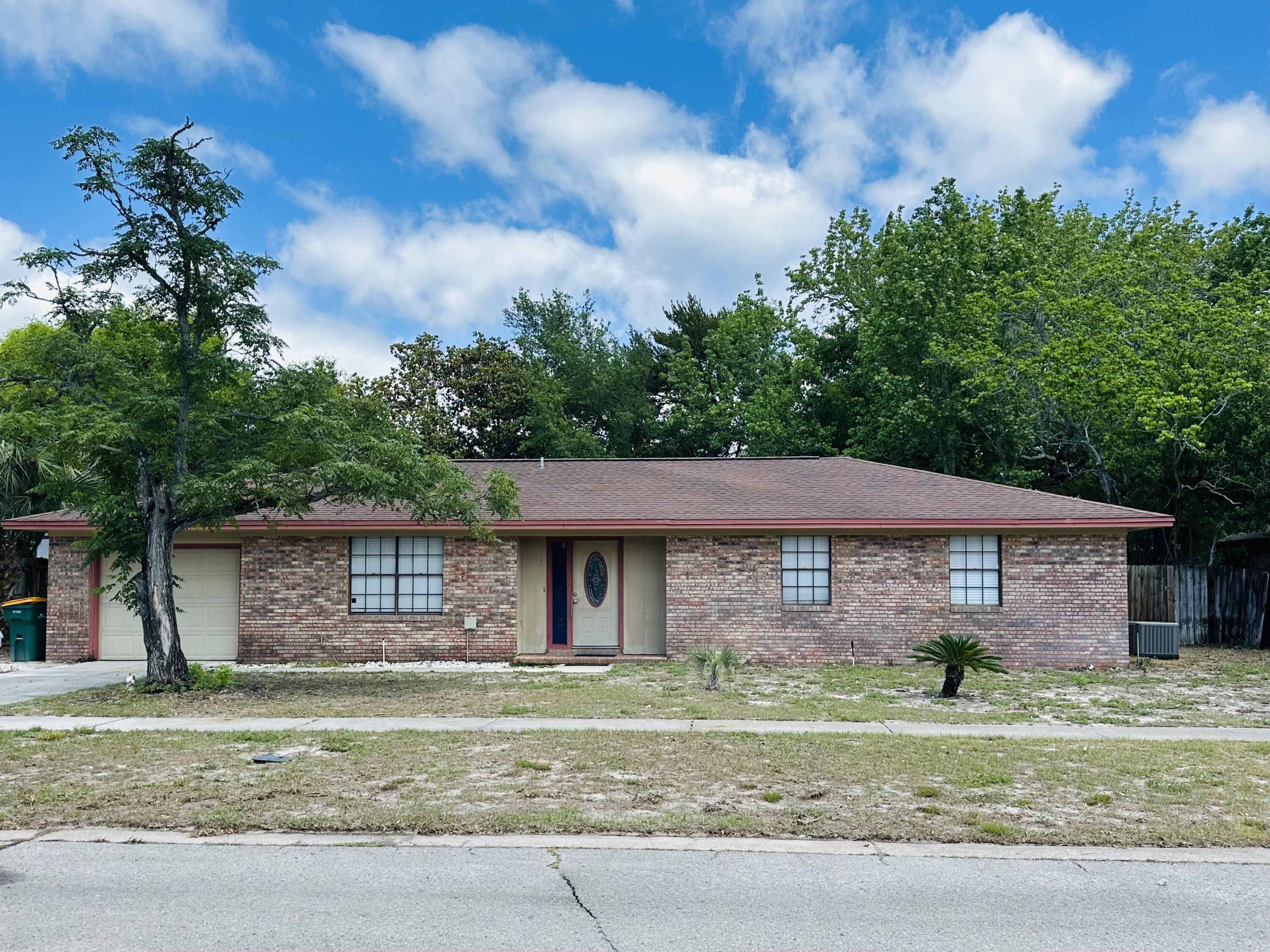 Located in the Heart of Destin on Sea View Dr (aka Christmas Tree Street)  3 Bedroom, 2 bath with office and garage.  AC replace 2023, Electrical box upgrade to Copper Wiring 2007, Large fenced back yard.  PROPERTY TO BE SOLD ''AS IS''.  It does need a little love.   Conventional loan or Cash