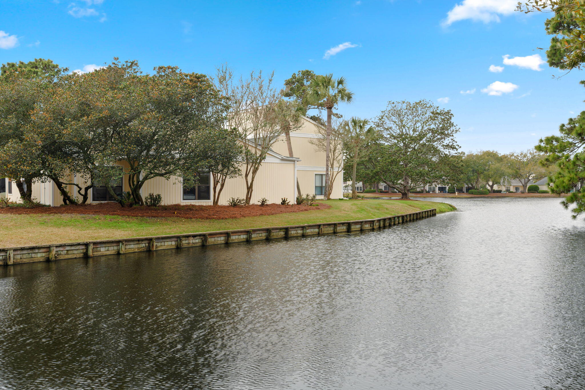NOW OFFERING A $10K CREDIT TO THE SELLER IF CLOSED BEFORE JULY 15!
Located in the quaint community of Sandpiper Village, this single story coastal inspired detached condominium home offers the privacy of your own home with all the comforts of care free condo living! The original screened porch has been converted to an extra heated/cooled living space, adding additional square footage not recorded. This home boasts new paint throughout, updated kitchen and baths, luxury vinyl flooring throughout!The main level master bedroom has a private ensuite equipped with a walk-in shower and a walk-in closet. From living area, a separate screened porch to relax and enjoy the resort lifestyle. Sandpiper owners also enjoy access to the two heated SOA pools. A 6-seater golf cart is included in the purchase of this fully furnished and turnkey gem! Sandestin Golf and Beach Resort features more than seven miles of beaches and pristine bay front, four championship golf courses, 15 world-class tennis courts, pickleball courts, 108 catch and release ponds stocked with bass (no fishing license required), a 226-slip marina, a fitness center, spa and celebrity chef dining. Shop, dine and play at the charming pedestrian village, The Village of Baytowne Wharf and more. Inside the gates of the resort, residents of the 72 distinctly different neighborhoods enjoy a balanced lifestyle of high-class living, spanning 2,400 acres from the beach to the bay. There are just over 4600 properties within the gates which offer 24 hrs./day gated security. Everything within the gates of the resort is accessible by golf cart or bicycle. The entire resort is interconnected by miles of pedestrian, bike and golf cart paths that weave through groves of live oaks, meandering past natural lagoons, fountains, man-made lakes, and meticulously landscaped fairways.
Just beyond the gates, Grand Blvd with its weekly farmers market, varied events and superb section of dining and shopping is readily accessible by golf cart. The Market Shops, on the south side of highway 98, boasting more dining and shopping choices, is easily accessible utilizing the tunnel beneath Hwy 98