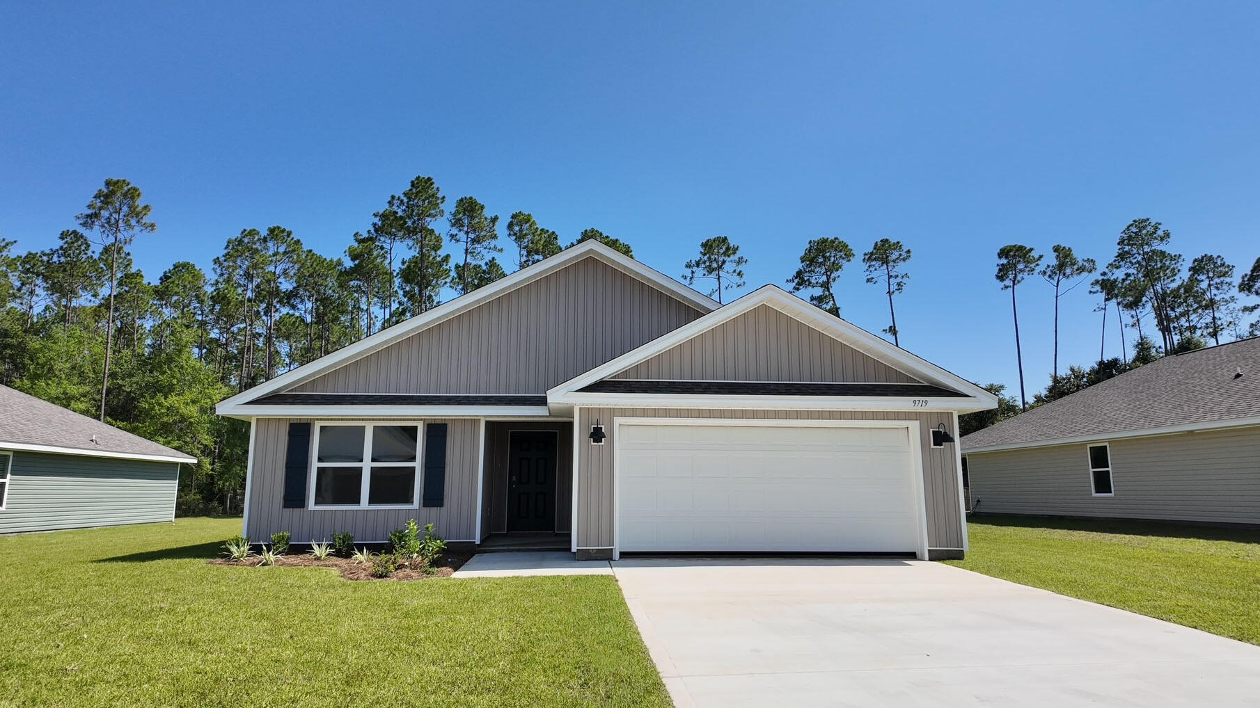 Welcome to the Lismore Plan, at Liberty Farms, our new home community in Milton, Florida! Just under 1,600 square feet, this beautiful single- story home offers 3-bedrooms with 2-bathrooms, a 2-car garage, and a seamless open layout with charming features. A 'Smart Home Connect' System with various convenient Smart Home devices. The well-appointed kitchen includes stainless steel appliances, a smooth-top range, built-in microwave, quiet dishwasher, corner pantry, island bar, eye-catching wood-look flooring, and plush carpet in the bedrooms. Quartz Countertops in the Kitchen & Baths. Fabric Hurricane window and door protection is also included. Enjoy the stylish curb appeal in this rapidly growing area with easy access to the interstate. ALL LISTING pictures, colors, features, and size may vary. Square footages are approximate.