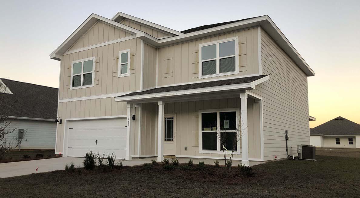 Welcome to Deer Ridge Crossing in Gulf Breeze, FL! The stunning Carol floor plan is a well-designed 2 story model. Highly desirable open concept. The kitchen, living room & dining area flow together for relaxed living. Open kitchen features: all stainless-steel appliances, pantry, Quartz kitchen countertops, nice island, smooth-top range, built in microwave & quiet dishwasher.  Bedroom 1 on the second floor offers a spacious walk-in closet, & adjoining bath has a double vanity, large shower, garden tub, linen and water closet. All baths offer Quartz countertops. This home comes standard with a Smart Home Technology package. Beautiful wood look engineered vinyl plank flooring throughout with nice carpet in the bedrooms. Fabric hurricane window protection is included. Must see! ALL LISTING pictures, colors, features, and size may vary. Square footages are approximate.