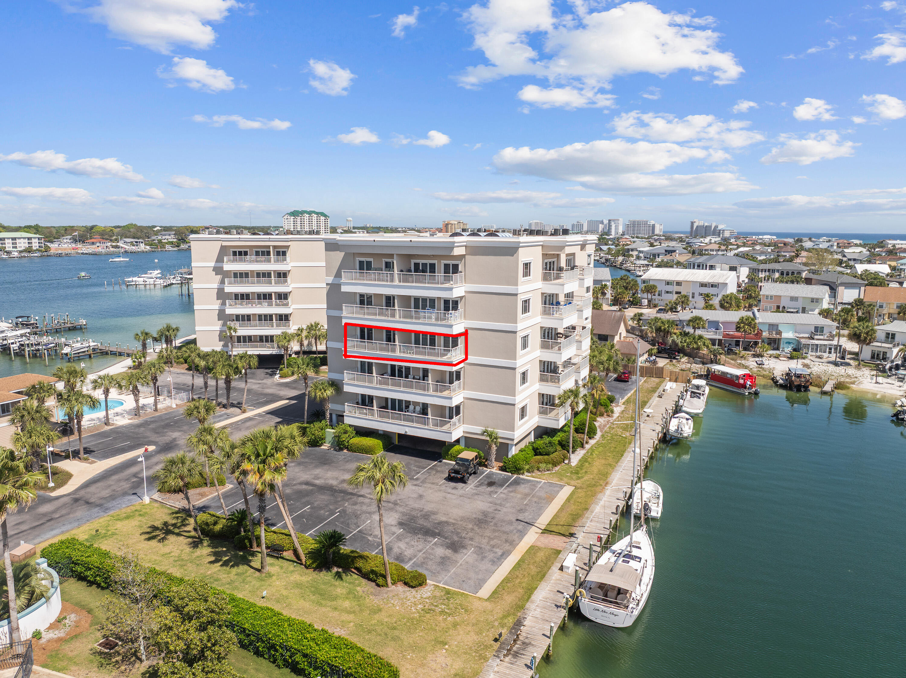 Wake up to breathtaking harbor views and experience the best of waterfront living in this beautifully maintained 2-bedroom, 1-bath condominium in the gated community of Sun King Towers, perfectly situated along the scenic harbor on Holiday Isle.  This move-in ready coastal retreat is being sold fully furnished, making it truly turnkey and ready for immediate enjoyment. Recent updates include a new refrigerator, new ice maker, and a beautifully remodeled bathroom, adding fresh style and convenience to this inviting harbor-front residence. Large windows capture the vibrant harbor scenery, creating a relaxing backdrop for everyday living or a peaceful getaway. Residents of Sun King enjoy a variety of amenities designed for the ultimate coastal lifestyle, including a harbor-front community pool, clubhouse and community room for gatherings, an outdoor entertainment area perfect for watching Destin's famous harbor fireworks, and a highly coveted private marina. Boat slips are available on a first-come, first-served basis, allowing you to enjoy boating on the harbor without the expense of purchasing a private slip--a rare and valuable opportunity for boating enthusiasts. Located just minutes from the sugar-white sands of the Gulf, you're only a short stroll or bike ride to the beach. When you want to explore the harbor without driving, simply call the Destin Water Taxi to transport you to nearby restaurants, shopping, and entertainment throughout Destin. With short-term rentals not  permitted, Sun King offers a peaceful and well-maintained residential environment--perfect for a primary residence, second home, or relaxing waterfront retreat.

If you've been searching for a furnished harbor-front condo with boating access, beautiful views, and a prime Holiday Isle location, this is an opportunity you won't want to miss.