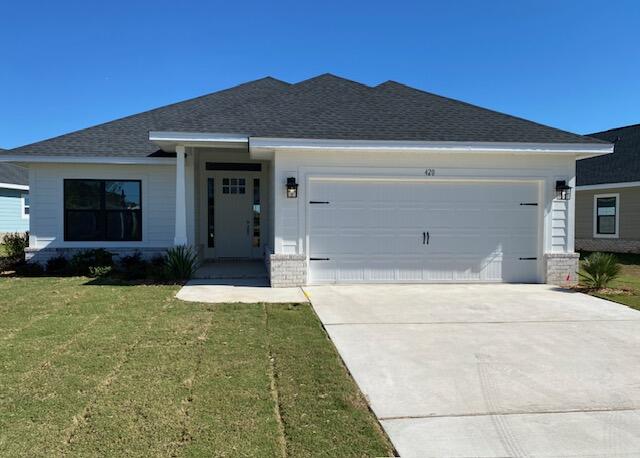 This popular Craftsman-style 4BR/2BA home (currently under construction: (Est. Aug/Sept completion) is ideally located in the back of the community backed up to woods. Designed with both comfort and style in mind, the home features HardieBoard® siding with a brick skirt, vaulted ceilings,  and CoreTec Pro Plus luxury vinyl plank flooring throughout--no carpet. The spacious primary suite boasts elegant tray ceilings, a generous walk-in closet, and a spa-inspired bath. Quartz countertops in the kitchen and baths, soft-close cabinetry, spacious covered patio complete this inviting home, perfect for relaxed everyday living and entertaining. Riverwalk residents enjoy a community pool, clubhouse, fitness center, scenic nature trail, and neighbor hood dock, offering plenty of opportunities to get outside and enjoy the Florida life style.  *Pics are of a similar home.*