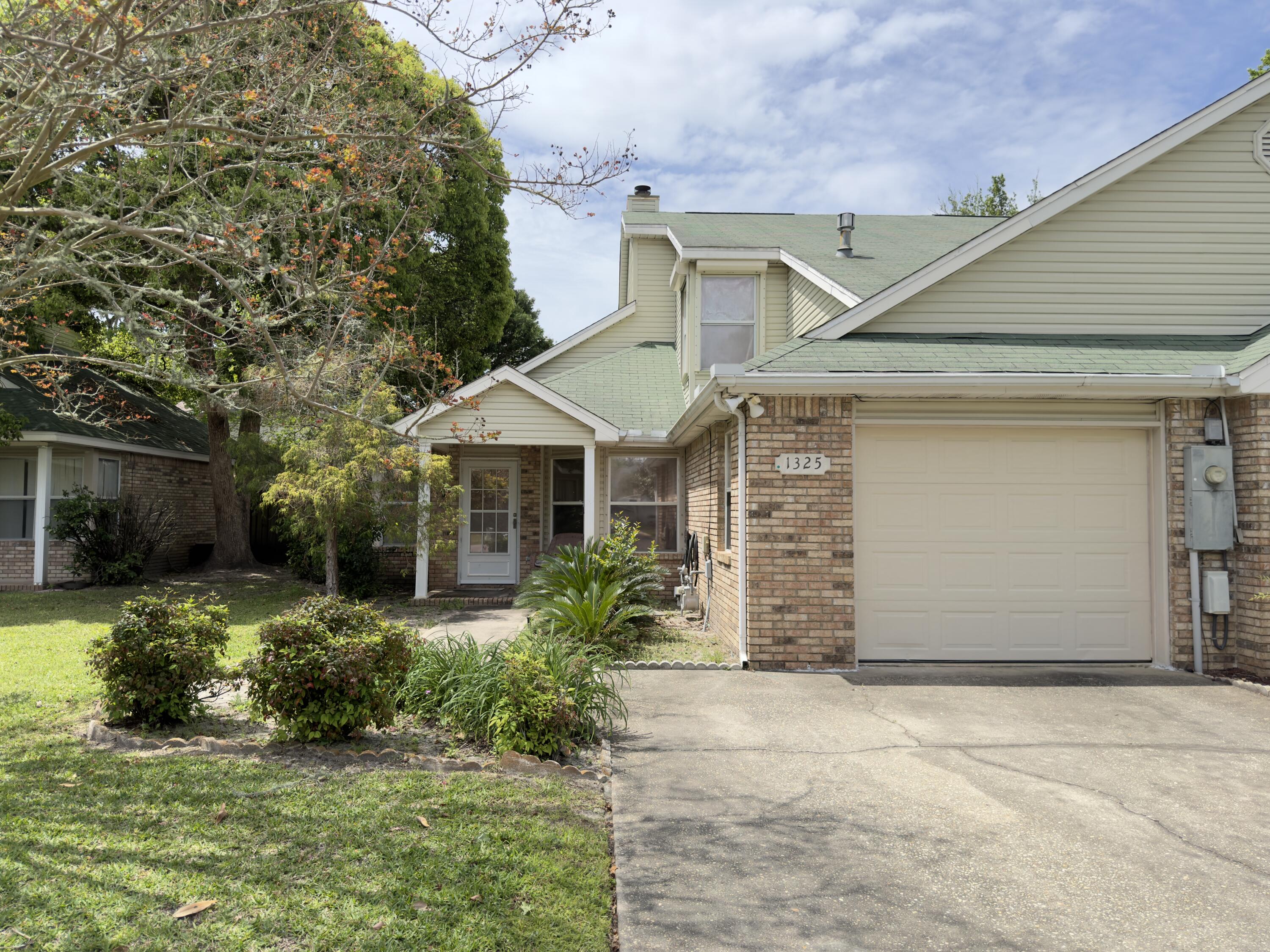 If you are looking to find a home that is affordable, just mins from Eglin, Shopping, Schools, Beaches, and more.. well welcome home! Built in 1994, this all brick attached home has all brick exterior and an attached 2 car garage. HVAC and Water Heater were recently replaced! This split bedroom home has the Master Bedroom and a full bath downstairs along with a dining area, large living room with cathedral ceilings, fireplace and a covered, screened patio just off the living room area. Upstairs you will find the remaining bedrooms and another bath. This home has tons of potential! Call today!