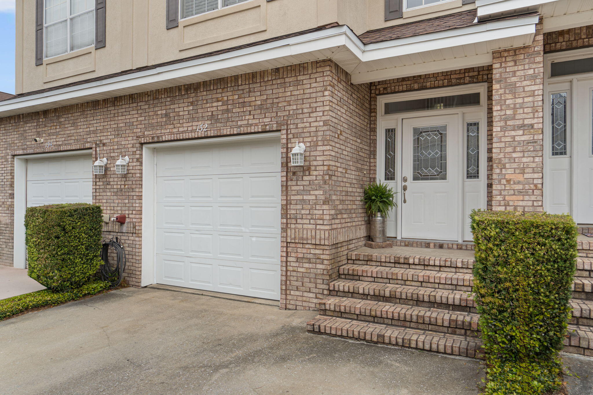 Welcome to low-maintenance living in the heart of Niceville with updates that truly set this home apart. Located in the desirable Big Oaks community near Turkey Creek Park, this beautifully renovated 3 bedroom, 2.5 bathroom townhome offers a level of finish rarely found in comparable units - all just minutes from Eglin Air Force Base, NWF State College, and the Destin-Fort Walton Beach Airport. From the moment you step inside, you'll notice the cohesive, modern feel created by luxury vinyl plank flooring throughout - no carpet anywhere. The home has been professionally updated with fresh interior paint, new recessed LED lighting, updated ceiling fans, and stylish fixtures throughout. The kitchen is both functional and inviting, featuring refinished cabinetry with updated hardware, stainless steel appliances, corian countertops, new faucets, and a layout that flows seamlessly into the living and dining spaces - ideal for everyday living or entertaining. Upstairs, both bathrooms have been thoughtfully upgraded with tiled showers, including a beautifully finished primary bath with glass doors and mosaic tile flooring. Additional improvements include updated vanities, fixtures, a new tub in the secondary bath, and refreshed finishes across all bathrooms. The HOA is responsible for the roof, the HVAC is 2018, and water heater is 2022. What truly makes this home stand out? It's done. No projects. No updates needed. Just move in and enjoy. Conveniently located near top-rated Niceville schools, shopping, dining, and outdoor recreation, this home is ideal as a primary residence, investment property, or for anyone seeking a low-maintenance lifestyle with high-end finishes.