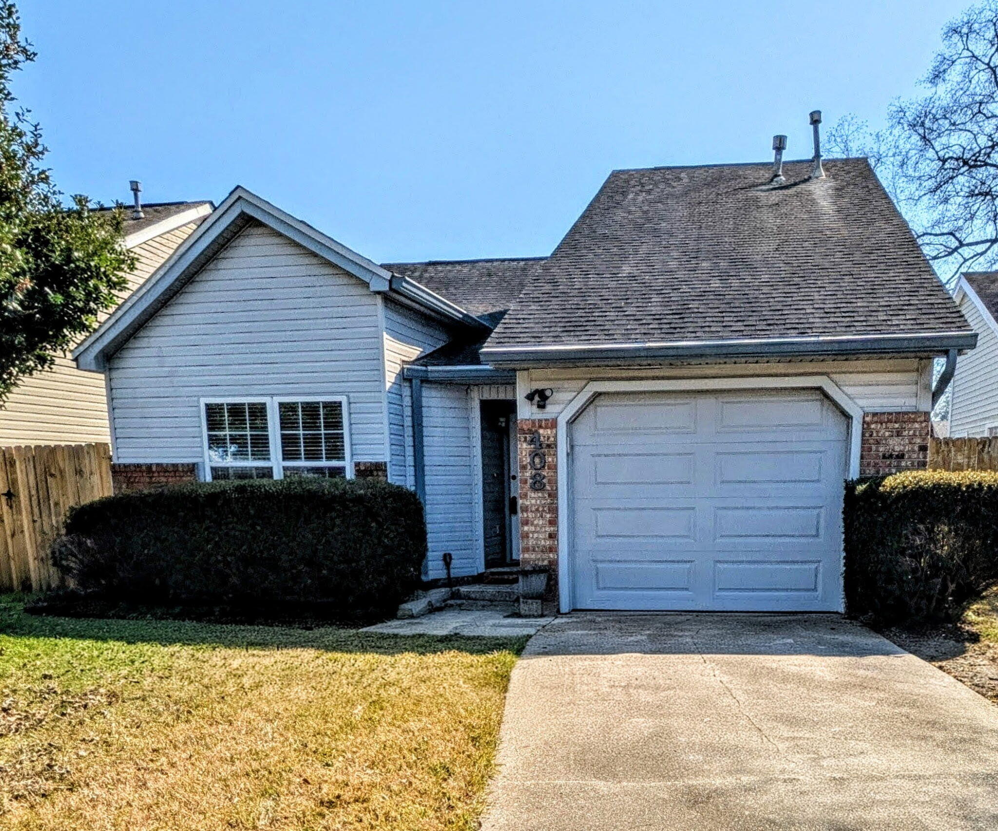 Beautifully updated 2-bedroom, 2-bath home with a one-car garage in Fort Walton Beach, perfect for a first-time buyer or those looking to downsize. The open-concept living area features soaring vaulted ceilings and a white brick fireplace. Modern tech upgrades include USB-integrated outlets throughout. The kitchen is a chef's delight with granite countertops and a premium LG ThinQ French-door refrigerator. Both bathrooms feature granite vanities, and the entire interior has been freshly painted. LVP flooring throughout with no carpet. Maytag washer and Kenmore Elite dryer convey. Enjoy the open patio plus ample storage in the yard building and attic.  Add this to your MUST SEE list today!