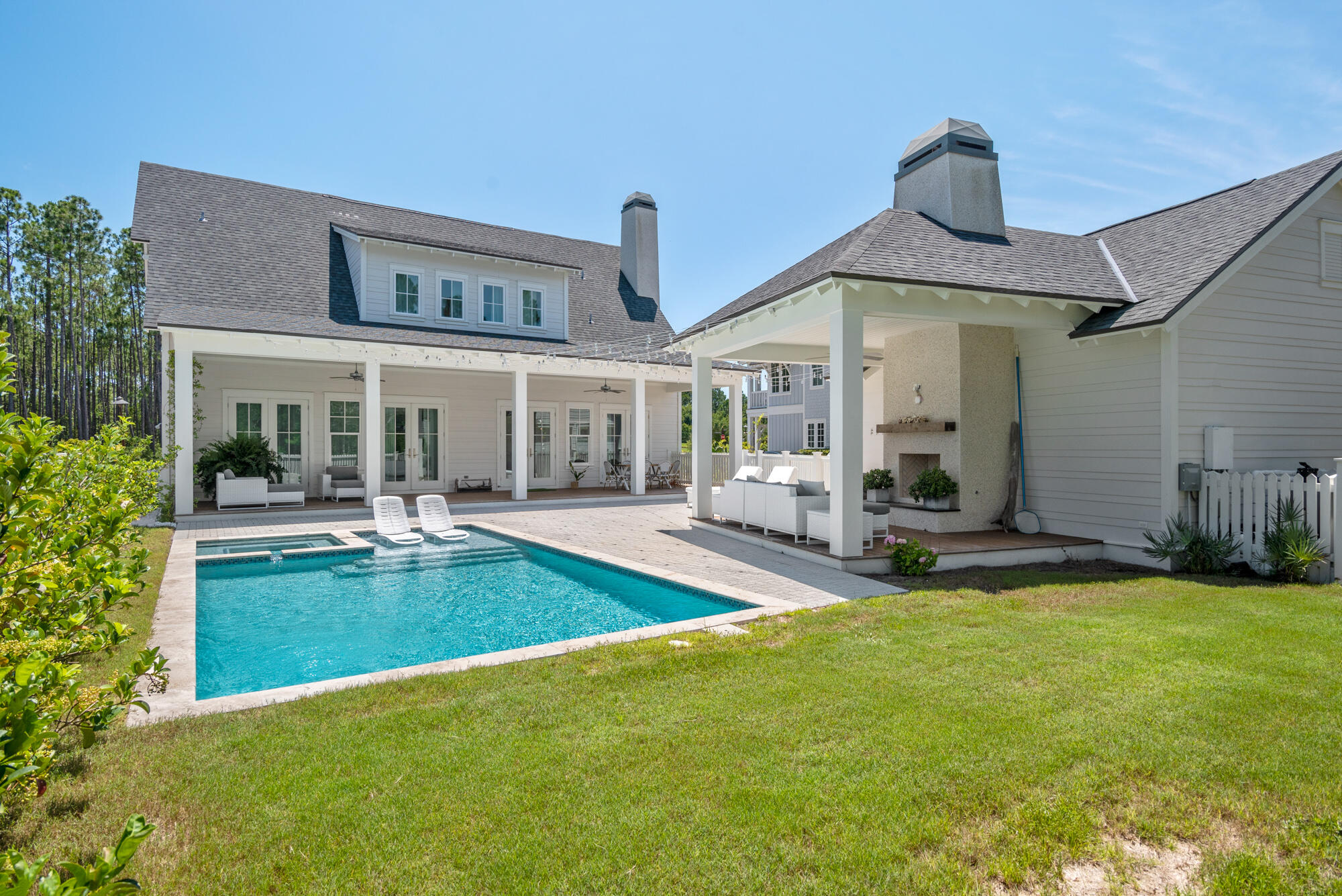 This gorgeous home with 10' ceilings is built by Jason Romair Homes. Located in the lovely Pathways, it features double porches with gas lanterns and ceiling fans for outdoor relaxation. It's a wonderful home for entertaining, as the very large living room area, with fireplace, spills out onto the outdoor patio with upgraded decking, pool, sauna, covered cabana w outdoor fireplace and TV connection. (Lounge in the heated pool, while you watch football and dry by the fireplace.) Kitchen has Quartz countertops and upgraded appliances, bathrooms have marble countertops.  Home has an ensuite Master on the Main,3 additional bedrooms upstairs, one of which can be a second Master as it has double sinks & a 2nd living bonus space on that level. WaterSound Origins is a true Community offering hiking trails, sports fields, unlimited golf, tennis, pickle ball, basketball courts. There is a community pool, playground, dock for launching kayaks, canoes, and paddle boards into Lake Powell. There are various clubs - Book Club, Card groups, Wine Tasting group, Bunko, and the HOA schedules lots of fun Community activities. It's a great place to live, with something for everyone! Buyers can also purchase a membership at the WaterSound Club for additional Golf Course availability at Sharkstooth and Camp Creek and access to their Beach Clubs.