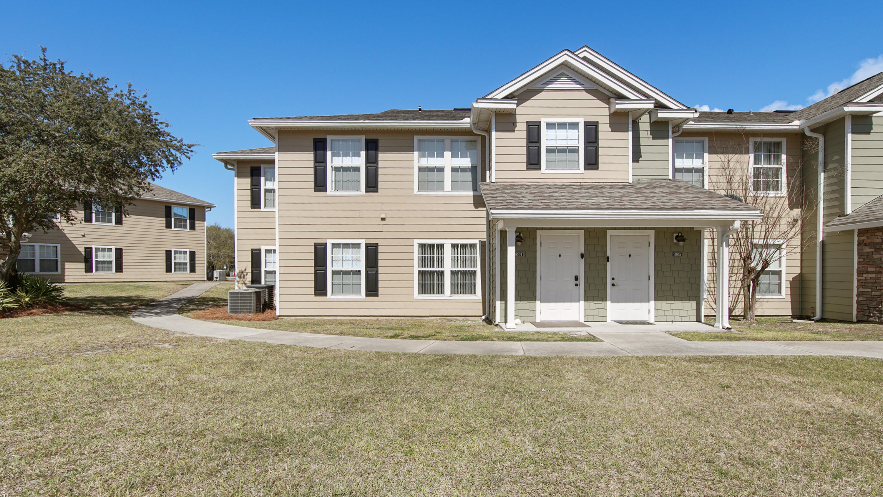 Welcome to Nautilus Cove in the heart of Panama City Beach. This 3 bedroom, 2 bathroom ground floor condo offers comfort, convenience, and a great location all in one. Inside you'll find new LVP flooring, fresh paint, and tons of natural light that makes the entire space feel bright and inviting. The kitchen features matching stainless steel appliances, a new sink and faucet, granite countertops and a separate pantry with plenty of storage. The dining area and kitchen bar feature darling shiplap accent walls, and new light fixtures throughout the home add a modern touch. The primary suite offers incredible closet space, including a well-designed shelving that helps keep everything organized. Both bathrooms have updated vanities, and the condo also includes a separate laundry room. Located on the ground floor, this unit offers easy access within this gated community. Nautilus Cove residents enjoy amenities including a large lagoon-style swimming pool, fitness center, playground, BBQ grills, picnic tables, and a community clubhouse for gatherings. The location is hard to beat. You're about a mile from beach access and just minutes from Pier Park, shopping, dining, and entertainment. Local favorites like The Pancakery, Runaway Island, and Zollo's Pizza are all nearby. Whether you're looking for a primary residence, second home, or investment opportunity, this condo offers a great chance to enjoy the Panama City Beach lifestyle in a convenient community.