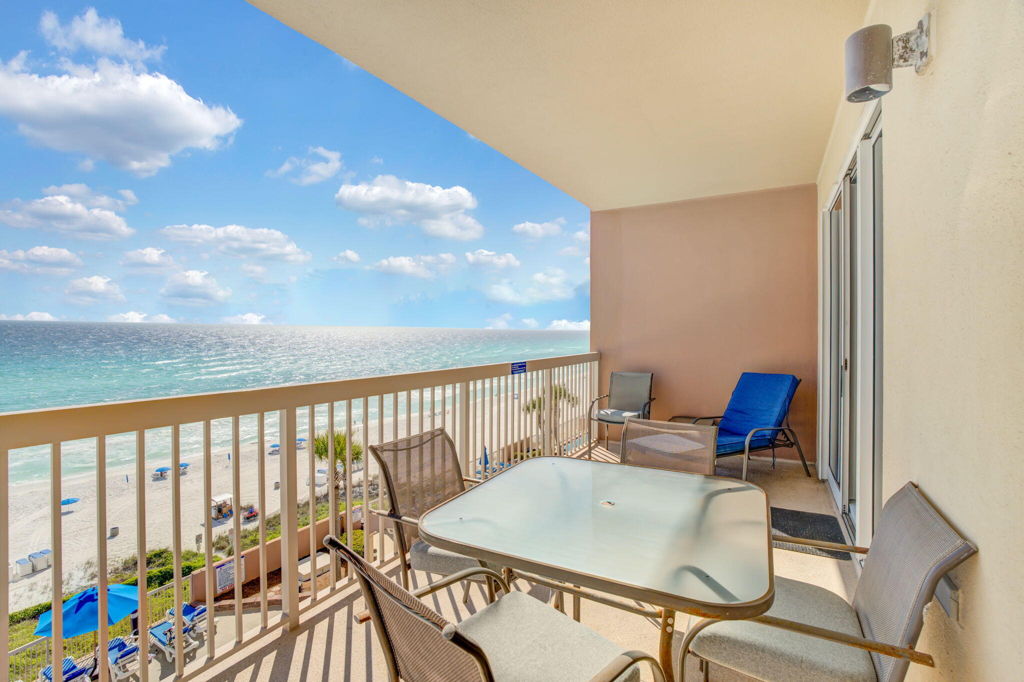 Living directly on the beach doesn't get better than this. Sunrise Beach Unit 803 sits right on the water with floor-to-ceiling views of the Gulf from both the living room and master suite -- emerald water, sugar-white sand, and front-row sunsets from your oversized private balcony. High ceilings, decor and tile throughout keep it cool and coastal. The layout is the real selling point: two full bedrooms, two full baths, plus a dedicated bunkroom enabling the unit to sleep 8 comfortably. It lives and rents like a 3-bedroom, which shows in the numbers -- peak nights fetch $400+, and the calendar is largely booked for the season. A separately deeded storage unit (valued at $15K) conveys with the sale -- a rare perk in this building.  Everything's been refreshed in the last four years: HVAC, stove, microwave, dishwasher, lighting, paint, and décor. It's truly turnkey -- no honeydew list, no off-season projects. Whether you're buying for the rental income or planning to actually use it, Unit 803 makes both cases easily.