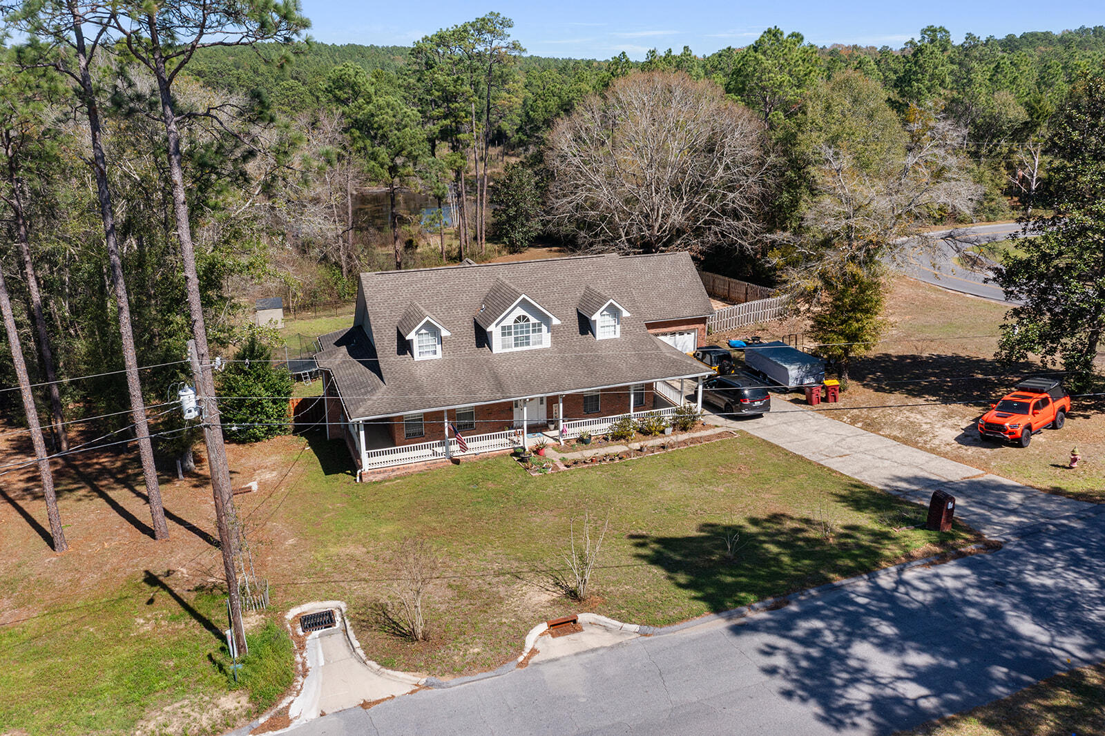 Rare opportunity! Enjoy 150' of lakefront living on a lush 1.33-acre estate. This expansive 4-bedroom home features a main-floor master suite with a whirlpool tub and dual walk-in closets. The heart of the home is the updated kitchen with a gas cooktop island and breakfast bar, flowing into a bright living space with a gas fireplace and new LVL flooring.

Love the outdoors? The 47' deck is built for summer BBQs and sunset views. With a dedicated 4th bedroom/office on the main floor, a spacious upstairs loft/sitting area, and a full basement for extra storage or hobbies, there is room for everyone. Don't miss out on this ''must-see'' waterfront classic!