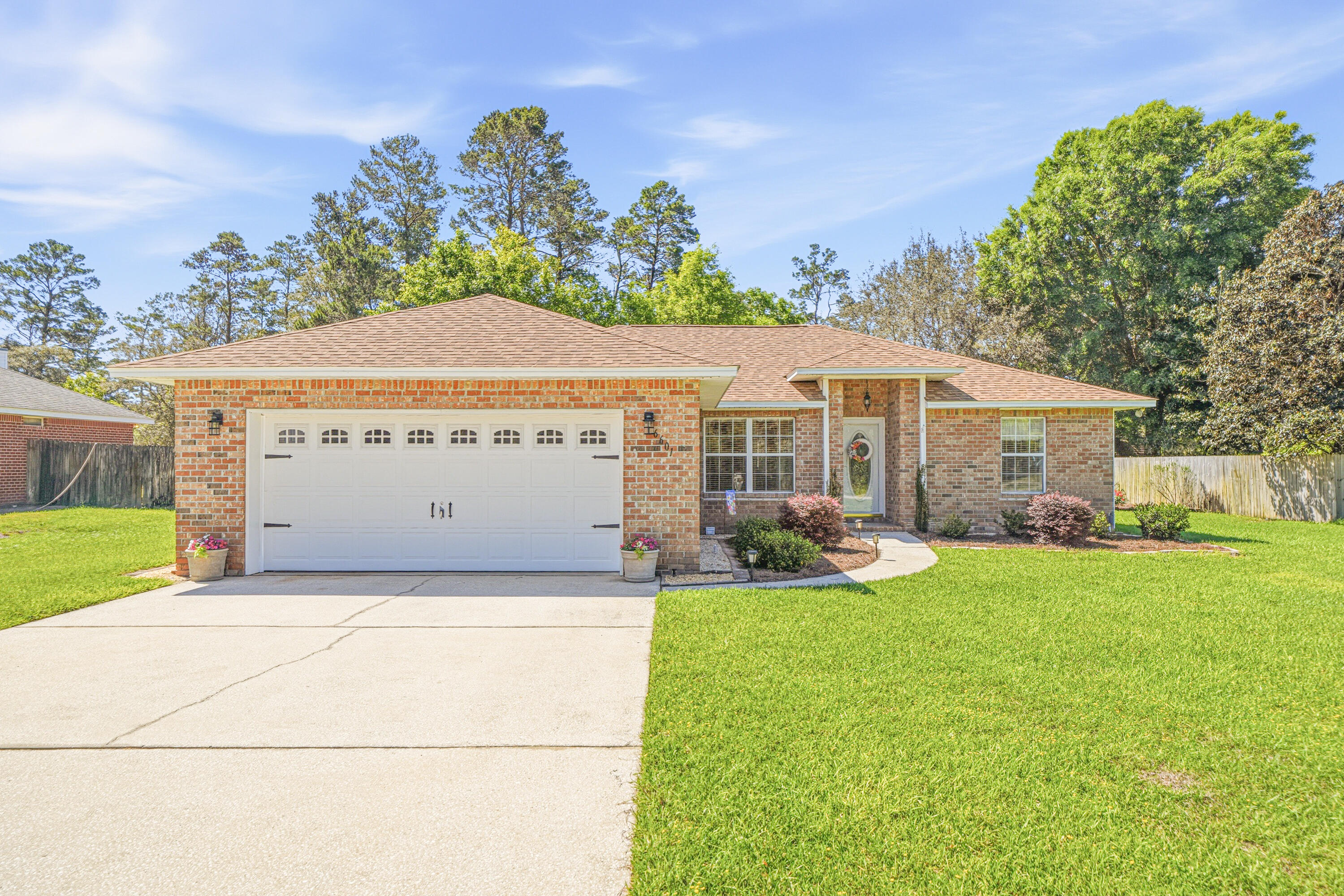 Welcome to a rare opportunity in the highly sought-after Holley by the Sea--just minutes from the sugar-white sands and emerald waters of Navarre Beach. This exceptional 3-bedroom, 2-bath home has been lovingly maintained by its original owners and has never been occupied by anyone else, showcasing true pride of ownership throughout.
Constructed with solid ICF (Insulated Concrete Form) construction, this home offers a level of strength, energy efficiency, and quiet comfort that stands above the rest--designed to withstand the elements while providing lower utility costs and a peaceful interior environment.
HUGE 16x20 shed with electric. From the moment you step inside, you'll notice the immaculate condition and care poured into every detail. The spacious screened porch invites you to unwind and enjoy the Florida life.