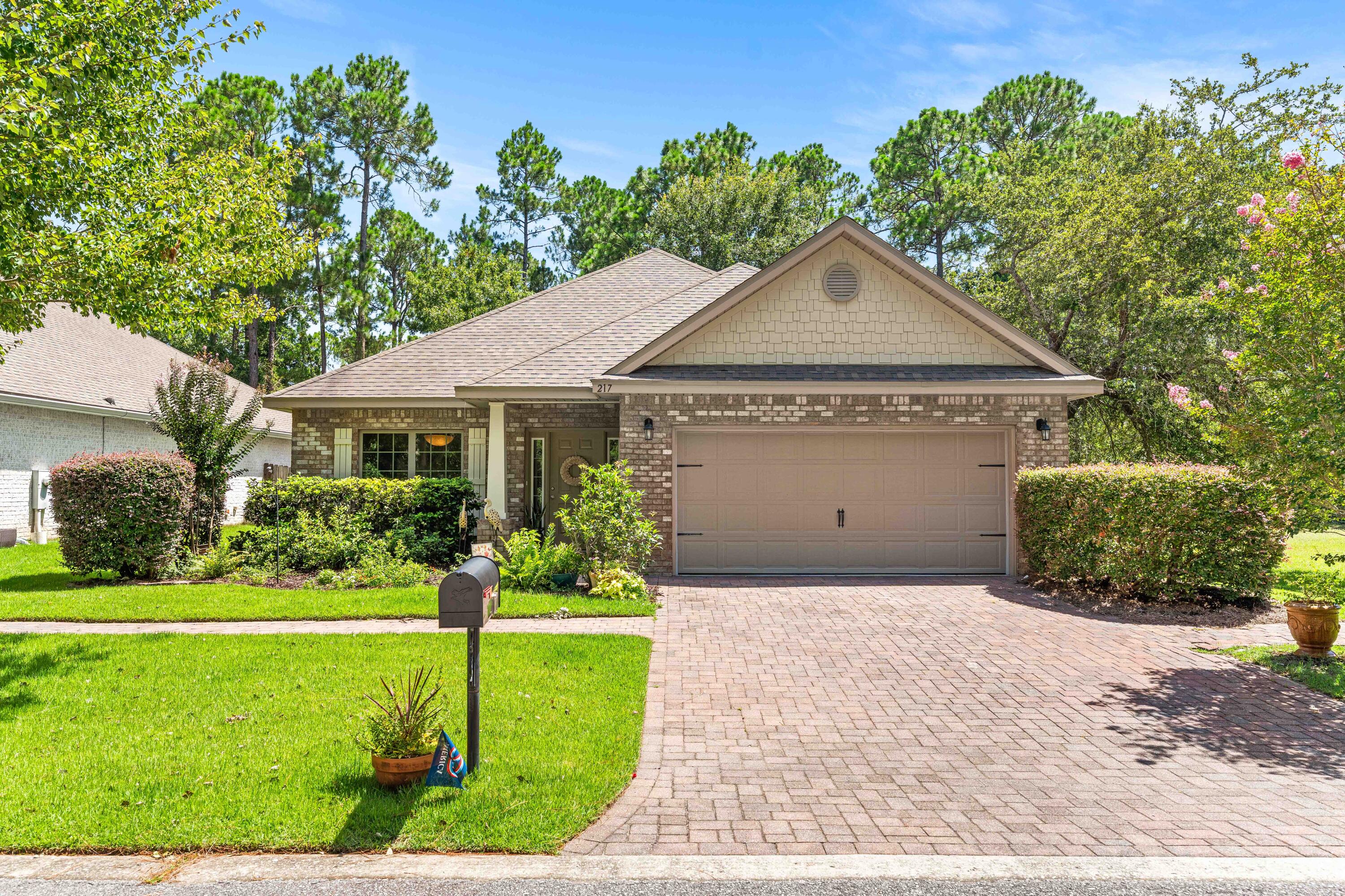 This beautiful 3-bedroom, 2-bath brick home is located in the well-established peaceful community of Harstvedt Plantation. Featuring an open-concept floor plan and a versatile flex room, this almost 2000 square feet of thoughtfully designed living space provides the perfect blend of comfort, functionality, and modern style. Step inside through the inviting entryway and discover luxury vinyl plank flooring throughout, creating a seamless and low-maintenance living environment, as well as updated lighting. The spacious kitchen is a true centerpiece, boasting granite countertops, a large center island, a stylish stone tile backsplash, stainless steel appliances, a deep sink, and beautiful wood cabinetry--ideal for both everyday living and entertaining. The private owner's suite offers a relaxing retreat with a generously sized walk-in closet and a spa-inspired en-suite bathroom featuring a granite double-sink vanity, a luxurious garden tub, and a beautifully tiled walk-in shower.  Additional highlights include a 2-car garage, a screened-in back porch perfect for enjoying Florida's year-round weather, and a fully fenced backyard offering privacy and space for pets, play, or outdoor gatherings.  Ideally located in the heart of Santa Rosa Beach, this move-in-ready home combines quality construction, stylish finishes, and a desirable floor plan, making it an exceptional place to call home. Perfectly located near Choctawhatchee Bay, water enthusiasts will appreciate convenient access to paddle-boarding, kayaking, boating, fishing, and so much more. Additionally, the sugar white sandy beaches, emerald waters and 24 miles of coastal highway 30A are only a short drive away. Other features of the home include: sprinkler system in front & back yard, low HOA fees; X flood zone community; the fact that the lot/backyard expands out past the fence line (see photo); and it is only a short distance to public beaches, state parks, biking on 30A, great restaurants, shopping centers, local businesses, US Gold Gym, schools, public buildings, and more.