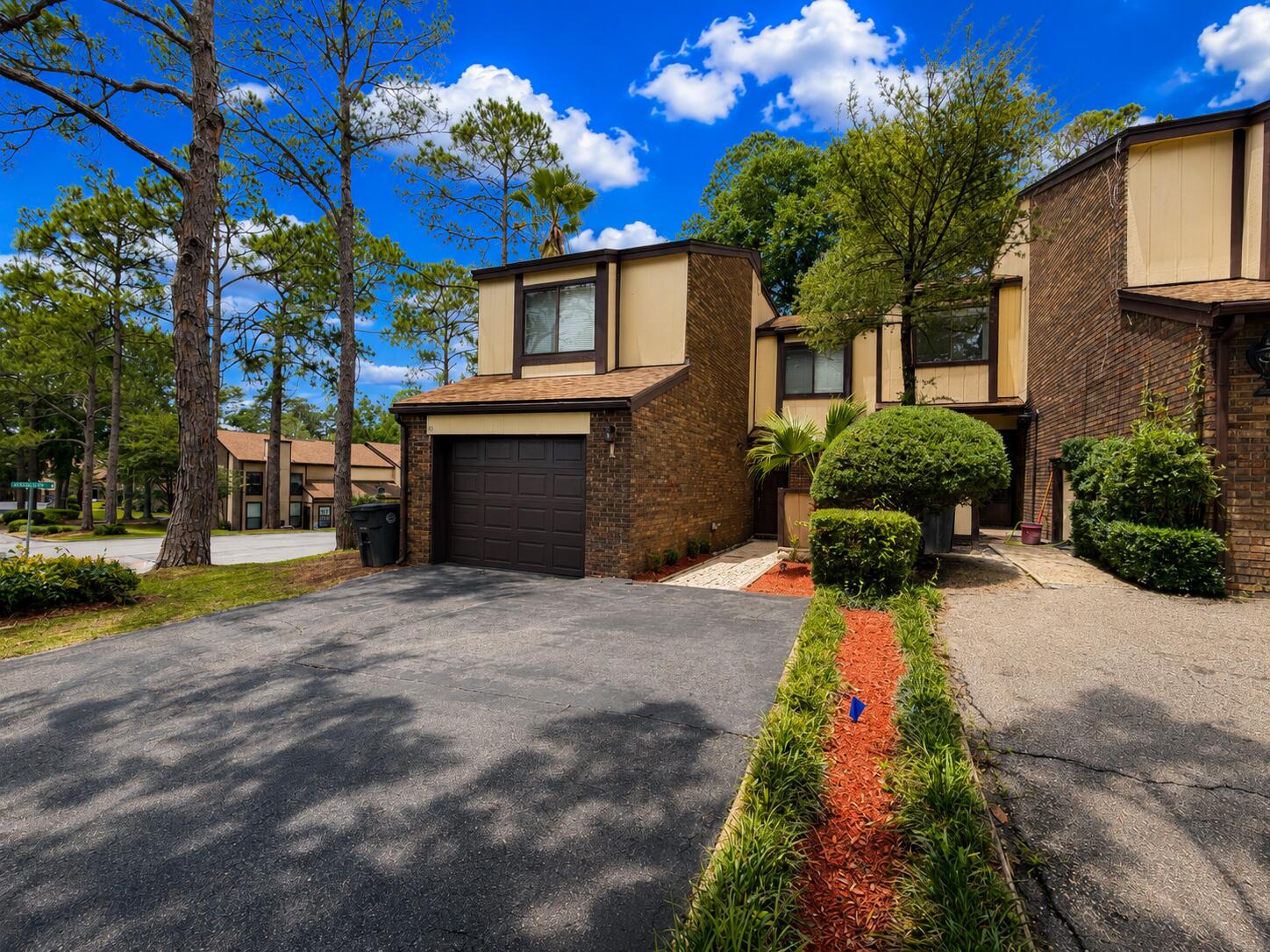Boat Slip available + LOW HOA in Hidden Cove! Located in the Hidden Cove waterfront community less than 10 minutes from Eglin AFB! This updated corner lot townhome offers 3br/2.5ba of low-maintenance living just steps from Tom's Bayou. Enjoy access to a private boat slip, bayside pool, clubhouse, and gym, while modern finishes and stylish custom upgrades give the home an upscale, move-in-ready feel. Inside, extra-wide sliding glass doors fill the open living and dining areas with natural light. The kitchen features updated laminate countertops, backsplash, under-cabinet lighting, and LG appliances including a double oven. A designer geometric wood feature wall at the staircase and a custom fireplace feature wall add modern architectural character.

The spacious primary suite includes a private screened balcony and an expanded dressing room/walk-in closet space that functions perfectly as a small office or vanity area with updated cabinetry, countertop, sink, and mirror. Both bathrooms have been remodeled with a walk-in shower in the primary suite and updated tub/shower combo in the guest bath. A second screened balcony off the main living area offers additional outdoor living space. Additional updates include a new hot water heater (2025), LG washer/dryer combo (2025), roof boot pipe replacements (2026), fenced rear patio, updated lighting, wall sconces, and smart appliances. This cornet lot, gorgeous townhome is waiting for someone to enjoy waterfront living with a low HOA!