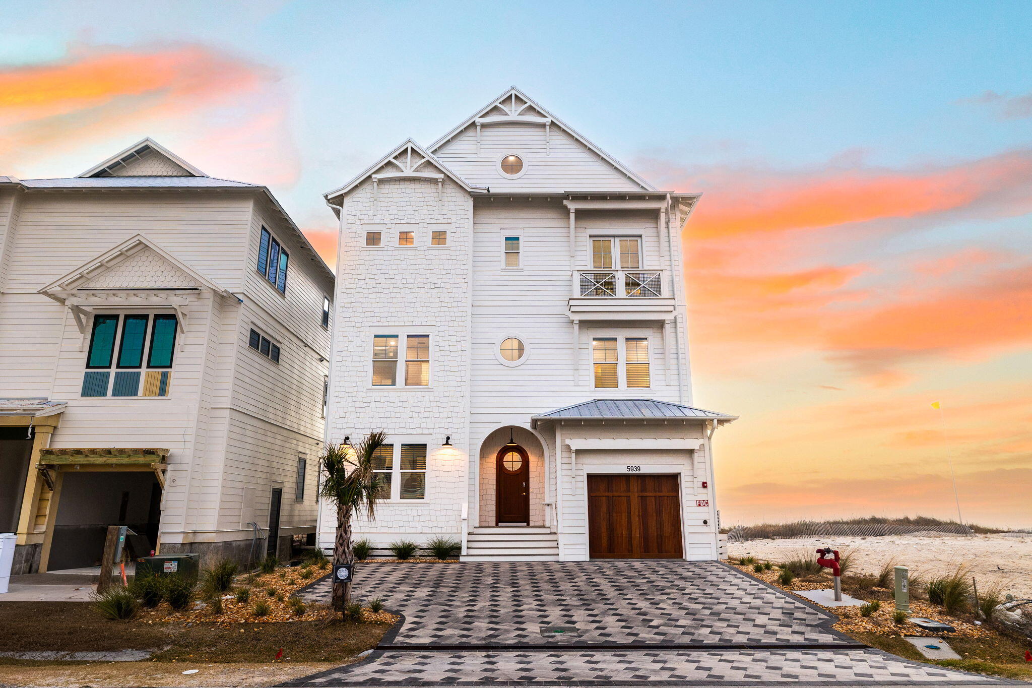 Experience the pinnacle of Gulf-front luxury at 5939 Gulf Drive, a newly constructed coastal estate located within the exclusive beachfront enclave of Hadley's Beach in Panama City Beach. Perfectly positioned directly on the sugar-white sands with 50 feet of Gulf frontage, this extraordinary four-story residence offers nearly 6,000 square feet of thoughtfully designed living space with 9 bedrooms, 10 full baths, 1 half bath, a bunk room, recreation room, private elevator, and a stunning private Gulf-front pool.

Designed to balance sophistication, comfort, and investment potential, this fully furnished home is already operating as a short-term rental opportunity. Expansive gathering spaces, multiple Gulf-front balconies, and panoramic emerald-water views create an unforgettable coastal experience for owners and guests alike. The open-concept main living area showcases elevated finishes, generous entertaining spaces, and seamless indoor-outdoor flow overlooking the beach.

Whether you are seeking a luxury second home, an elite investment property, or a legacy beachfront estate, 5939 Gulf Drive delivers an exceptional opportunity to own one of Panama City Beach's newest premier Gulf-front residences.