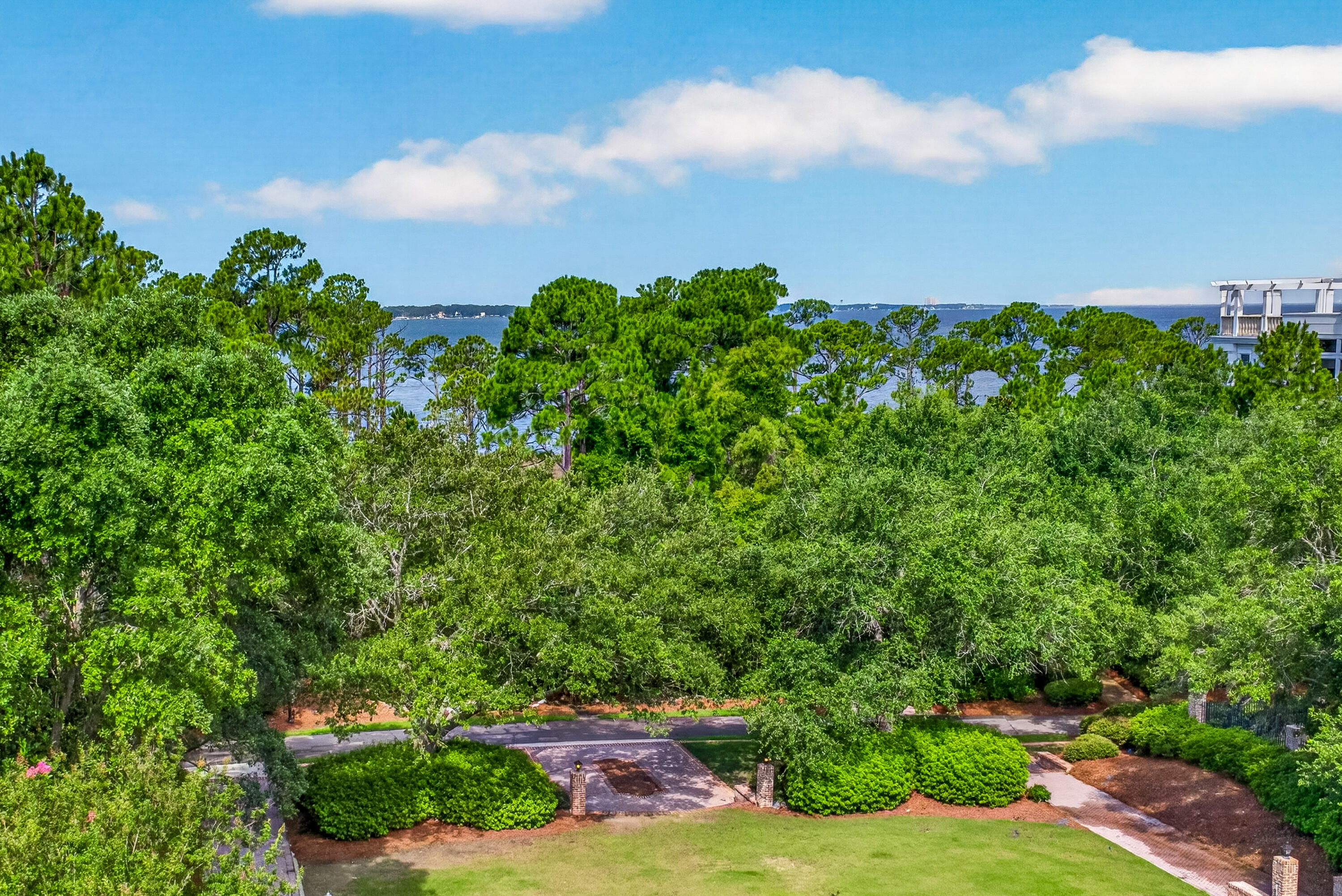 Perched on the 5th floor, this bay-facing studio offers stunning views and a coveted private balcony with comfortable seating for two--the perfect spot to enjoy your morning coffee, unwind with an evening cocktail, or take in spectacular sunsets over the Choctawhatchee Bay. Ideally positioned overlooking the Grand Events Lawn, you'll have a front-row seat to many of the resort's special events and festivities.

Beautifully refreshed in March 2024, the studio features all-new, elegant furnishings and stylish tile flooring throughout, creating a sophisticated coastal retreat that's both inviting and easy to maintain. Thoughtfully equipped for extended stays, the unit includes a convenient two-burner cooktop and a spacious 14-cubic-foot refrigerator, providing added functionality for owners and guests alike.

The Grand Sandestin welcomes owners and guests with timeless architecture and an impressive collection of resort-style amenities, including a zero-entry swimming pool, and fitness center,, convenient on-site check-in, and seasonal concierge services. Just steps away, the vibrant Village of Baytowne Wharf offers an exceptional blend of waterfront dining, boutique shopping, family-friendly attractions, live entertainment, festivals, and year-round events--making this an ideal vacation getaway, rental investment, or personal coastal escape. As an introduction to the Sandestin lifestyle, we invite our new owners to explore amenities that make Sandestin special. The listing brokerage and seller(s) are presenting the buyer(s) of this property with (2) 90-minute rounds of Tennis court time, a golf foursome at one of our three championship courses, and a round of golf for up to four (4) players at the unrivaled Burnt Pine Golf Club.

Sandestin Golf and Beach Resort features more than seven miles of beaches and pristine bay front, four championship golf courses, 15 world-class tennis courts, a 226-slip marina, a fitness center, spa and celebrity chef dining. Shop, dine and play at the charming pedestrian village, The Village of Baytowne Wharf and more. Inside the gates of the resort, residents enjoy a balanced lifestyle of high-class living, spanning the 2,400 acres from the beach to the bay. Everything within the gates of the resort is accessible by golf cart or bicycle. The entire resort is interconnected by miles of pedestrian, bike and golf cart paths that weave through groves of live oaks, meandering past natural lagoons, fountains, man-made lakes, and meticulously landscaped fairways.