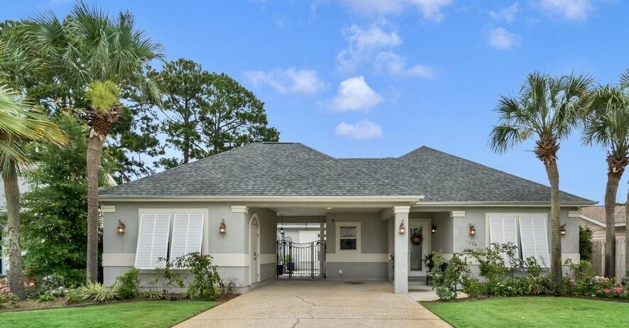 Welcome to waterfront living in Polynesian Isles, where 70 feet of canal frontage provides direct access to Pensacola Bay and every day feels like a vacation. Major updates are already complete, including a new roof (2025), HVAC (2020), water heater (2020), newer kitchen appliances, and updated dock and seawall decking. Boaters will appreciate the covered electric boat lift and vinyl seawall. While the backyard is designed for effortless entertaining. Enjoy a sparkling pool with a heater/chiller, electric cover, a newer liner (2023), and a new cement patio--perfect for relaxing and gathering with friends and family. Inside, the spacious kitchen features a large bar and dining area that naturally brings everyone together. The split-bedroom floor plan offers privacy, and smart-home features including Alexa-controlled switches, locks, thermostat, and electric curtains add convenience. The versatile third bedroom has a private entrance, making it ideal for guests, a home office, multigenerational living, or potential rental use. There is also a storage room under the existing roofline to expand into a larger suite with a walk-in closet and full bath. Short-term rental projections estimate up to $55,000 in annual gross income. Residents enjoy underground utilities, a community boat launch, voluntary HOA dues of just $50 per year, and access to A-rated schools. Bring your boat, your swimsuit, and start living the Gulf Coast lifestyle today.