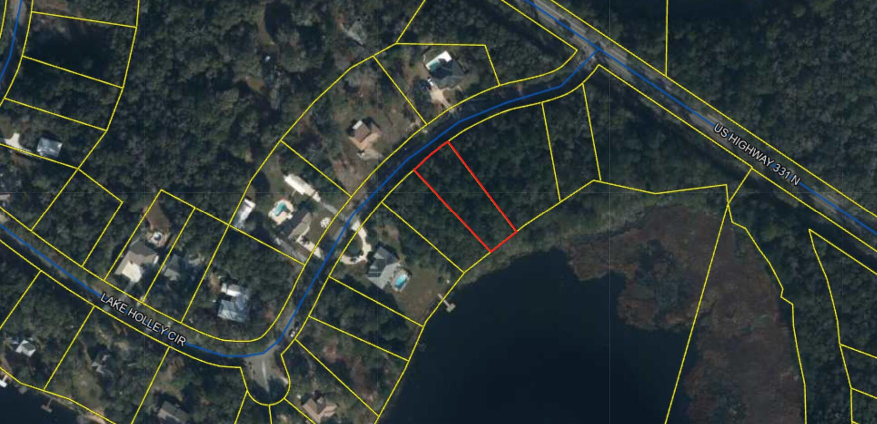 Discover the epitome of lakeside living at Lake Holley Estates with this captivating waterfront lot, spanning an impressive .514 acres. Nestled within a serene enclave, this parcel offers an unparalleled opportunity to create your dream retreat amidst nature's embrace.

Immerse yourself in the tranquil ambiance as you envision your custom-built sanctuary overlooking the glistening waters of Lake Holley. With generous dimensions and prime positioning, this lot beckons to those with discerning tastes for waterfront elegance.

Indulge in endless possibilities for outdoor recreation, from leisurely boating adventures to peaceful lakeside picnics. Embrace the soothing melodies of nature while relishing in breathtaking sunsets that paint the sky with hues of gold and crimson. Located in a community renowned for its scenic beauty and coveted privacy, this property presents a rare chance to purchase a coveted slice of lakeside paradise. Whether you aspire to build a year-round residence or a weekend getaway, this idyllic setting offers the ideal canvas for your vision to unfold.

Seize the opportunity to embark on a lifestyle defined by tranquility, luxury, and natural splendor. Create lasting memories against the backdrop of Lake Holley's serene waters, where every day feels like a blissful escape. Live the waterfront dream - your journey begins here."